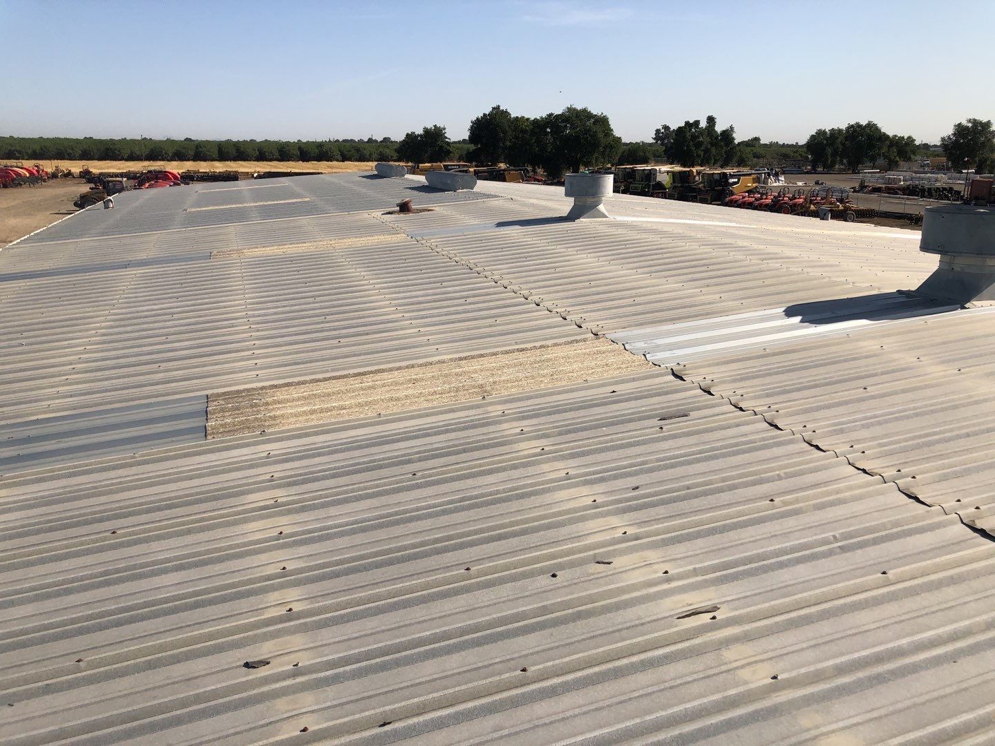 Spray foam and coatings using Conklin Benchmark/PUMA XL coatings and spray foam by Straight Edge Roofing Inc