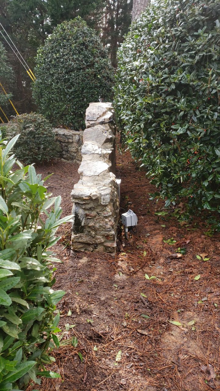 Neighberhood entrance sign cleaing using cleaner by Power Wash Masters LLC