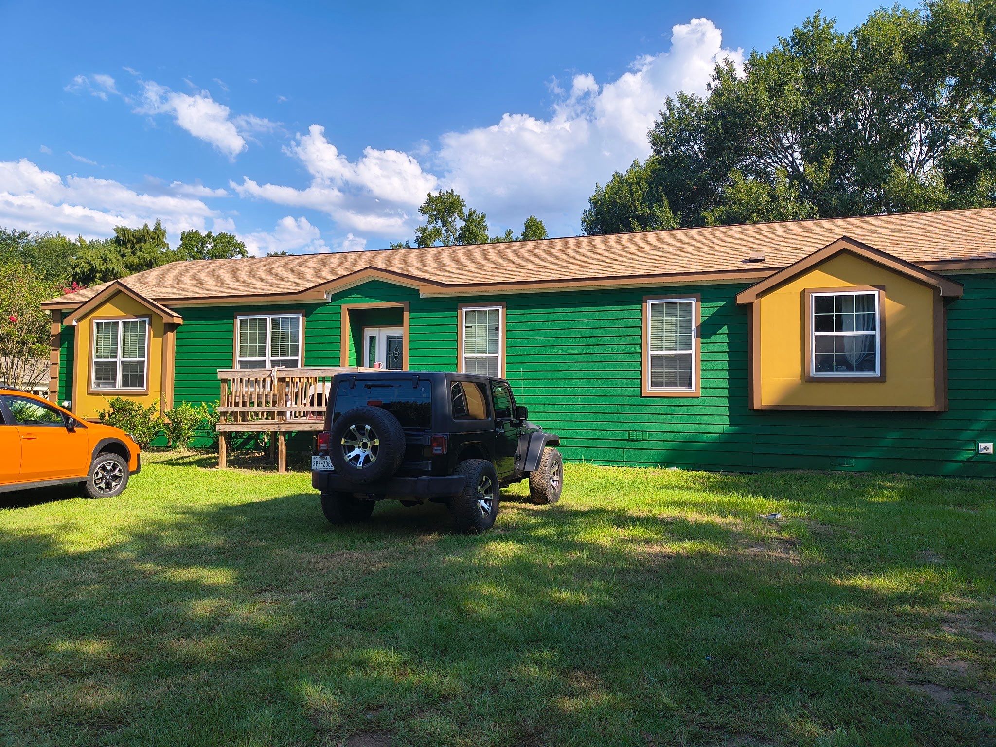 Exterior Painting in Lindale, TX | Bright Green Wood House Repaint by Quality Coats Painting