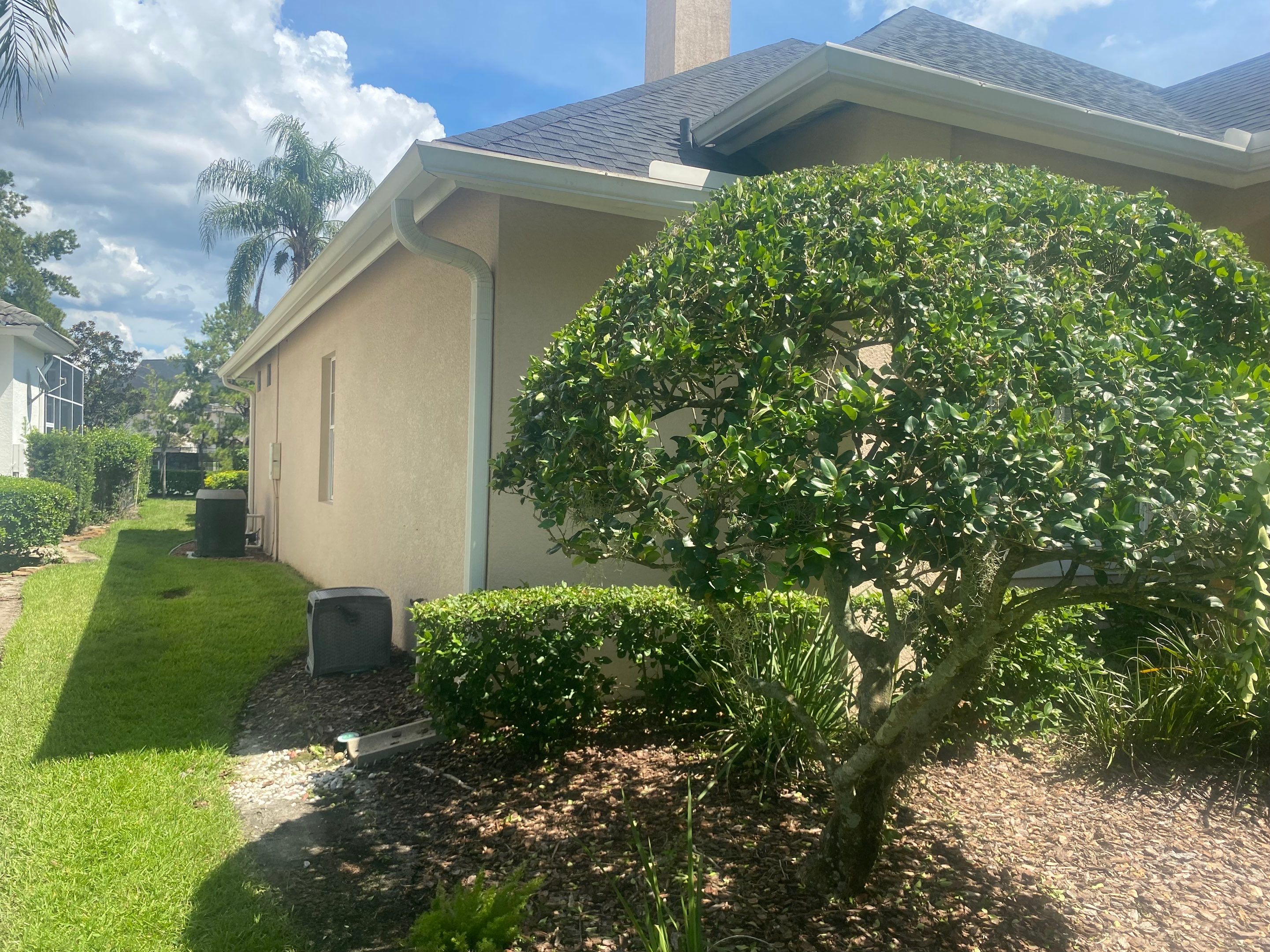 White Gutters and White Downspouts by Gutter Professors