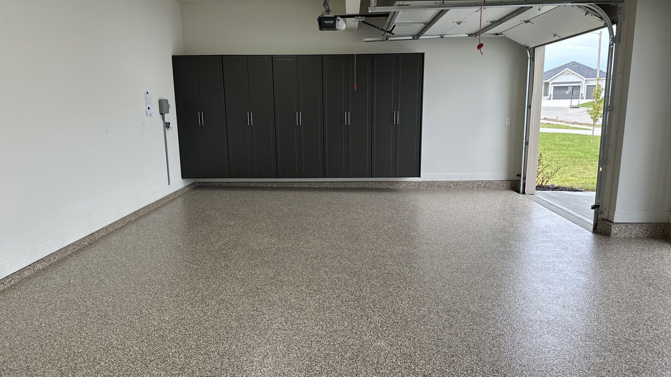 Ron B. upgraded his garage with cabinets and a Banner Garage Floor by Banner Garage