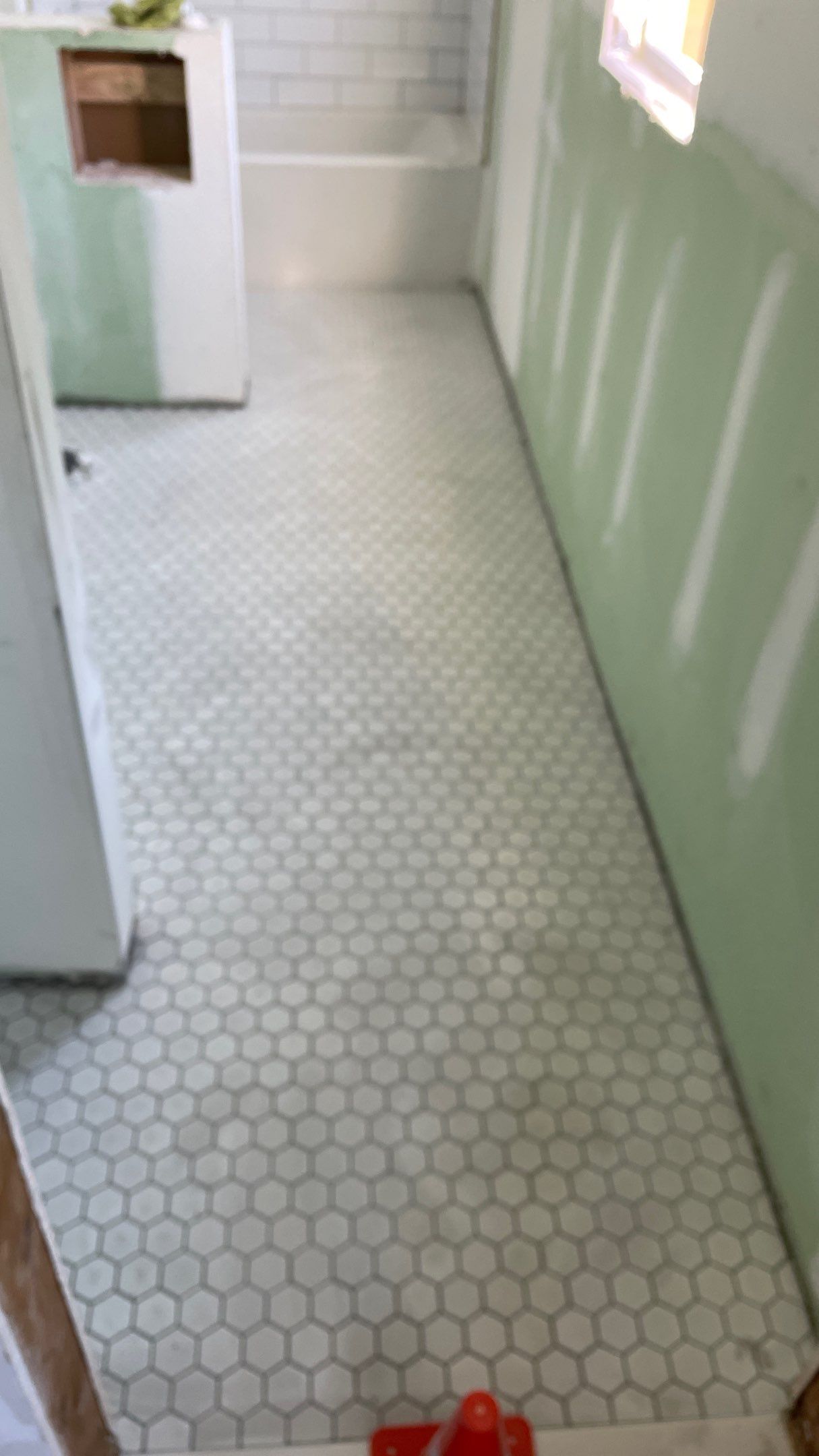 Remodeled Home with new tile floors, Showers and Refinished Oak Floors with stain and Waterbased Finish by Footprints Floors of Coastal Carolina