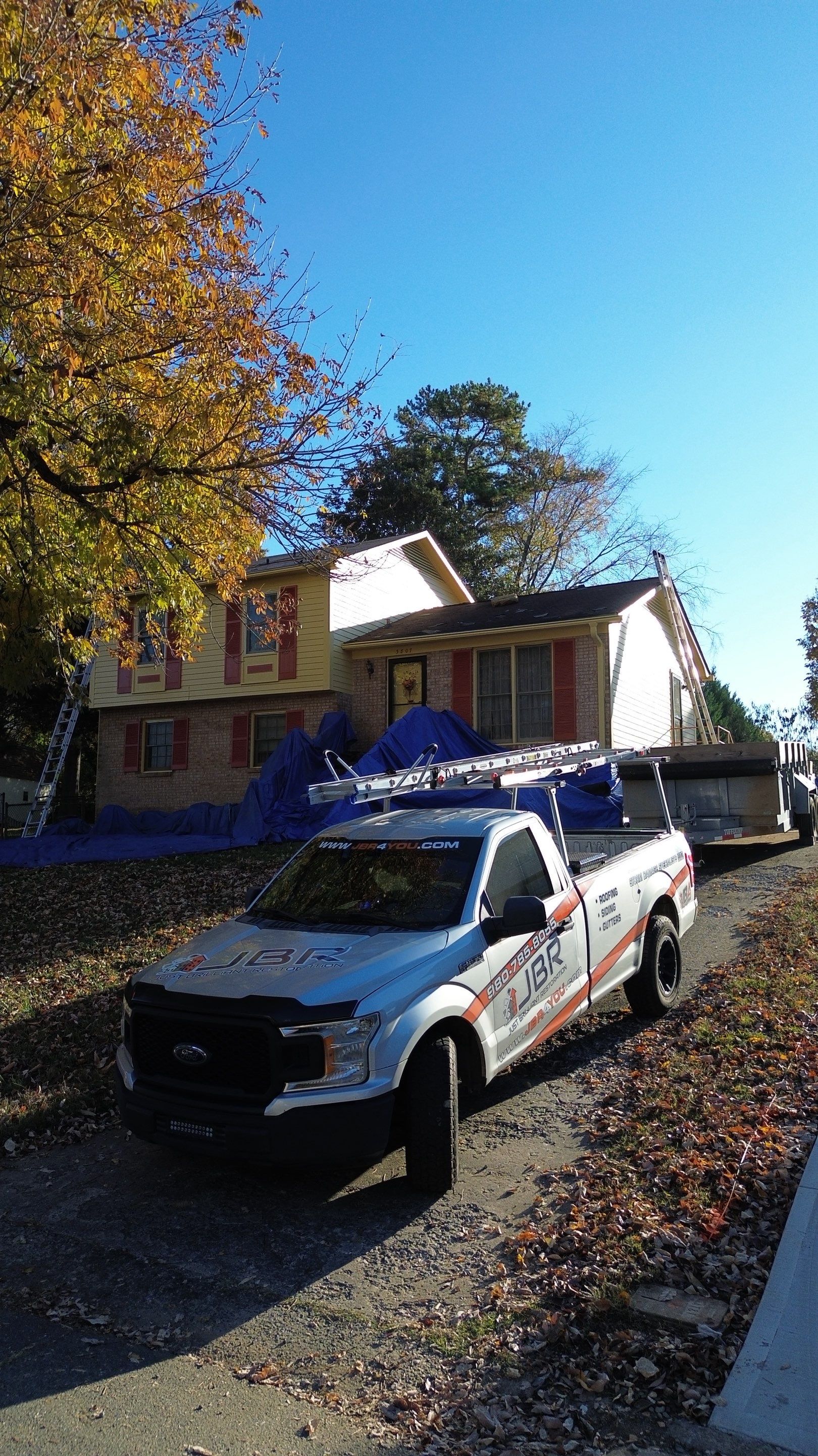Roof replacement by wind damage by Just Brilliant Restoration JBR