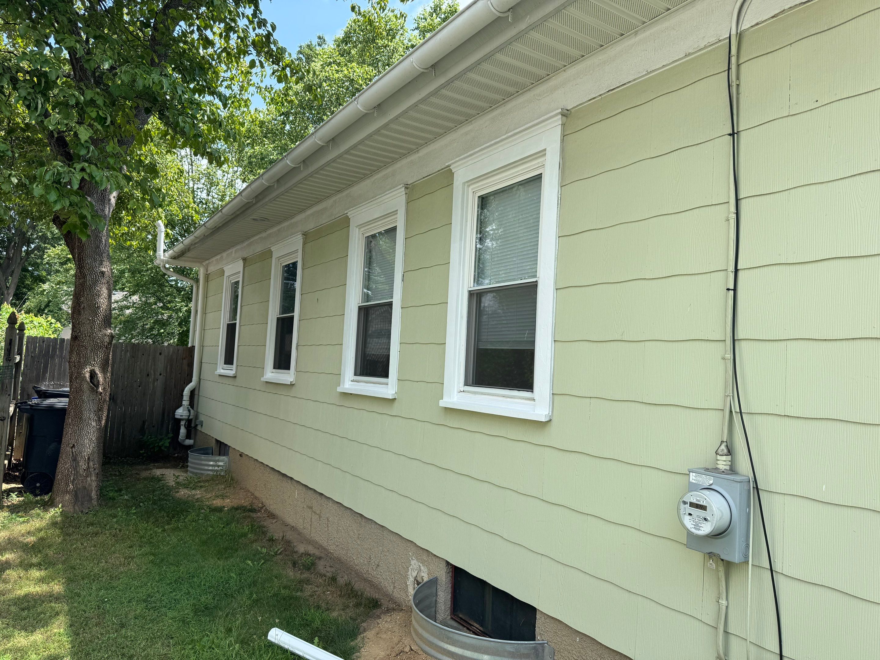 Window wells, exterior painting, basement waterproofing. by AXR Inc