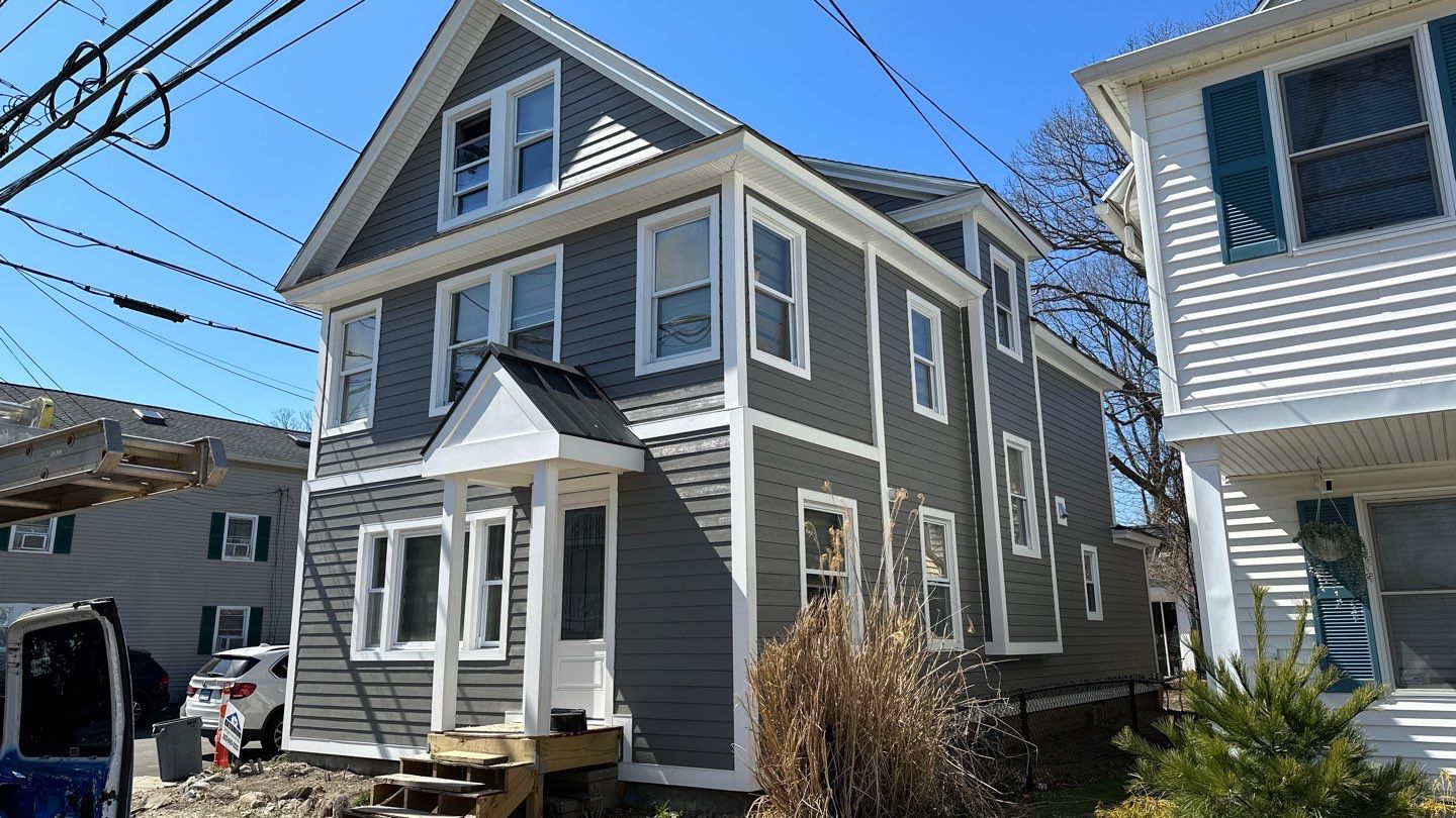 Siding Installation using Hardie Plank Aged Pewter by A Plus Exterior
