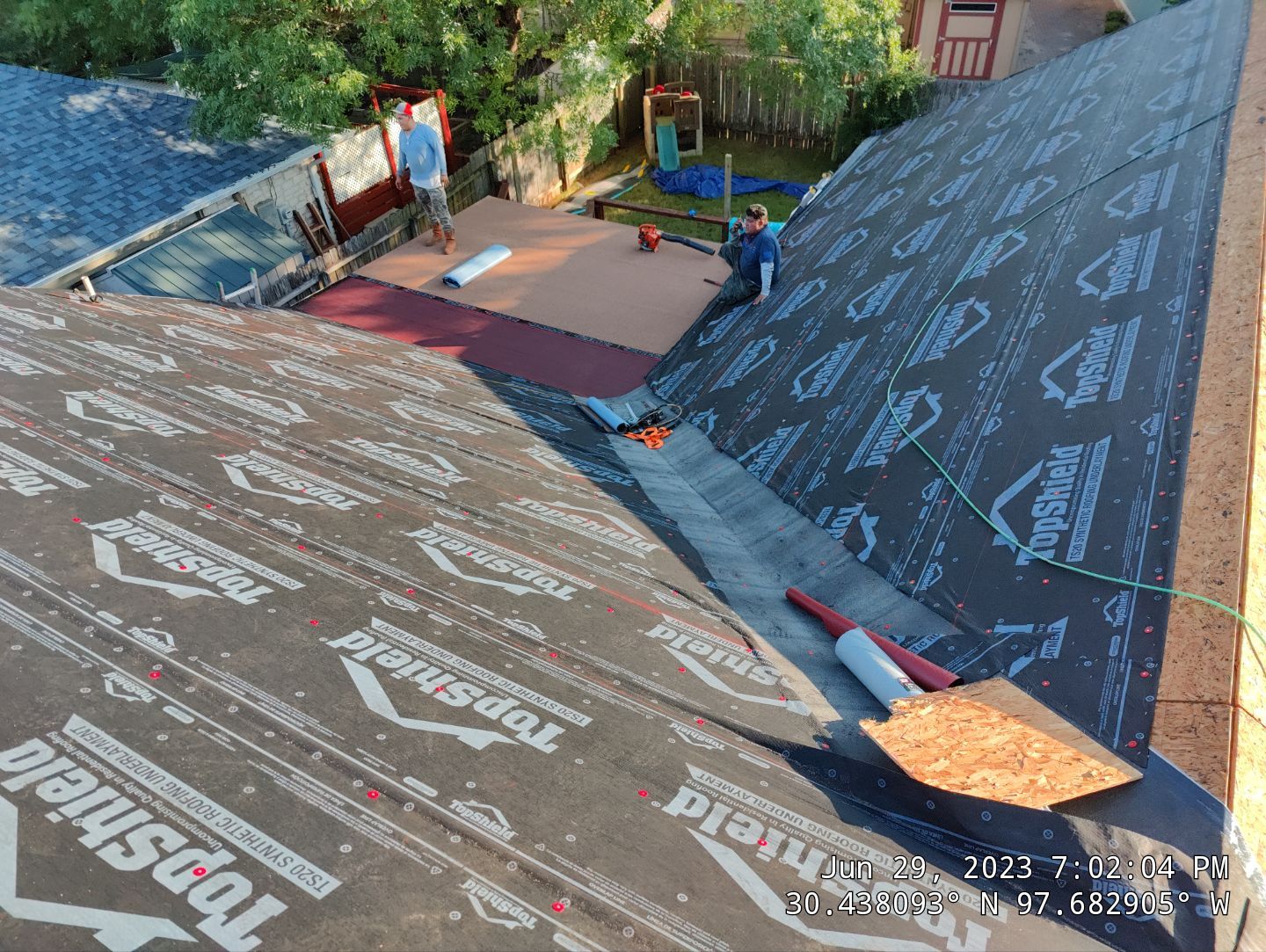 New Roof Installation Of IKO Dynasty Color Brownstone by DeZign Roofing & Exteriors
