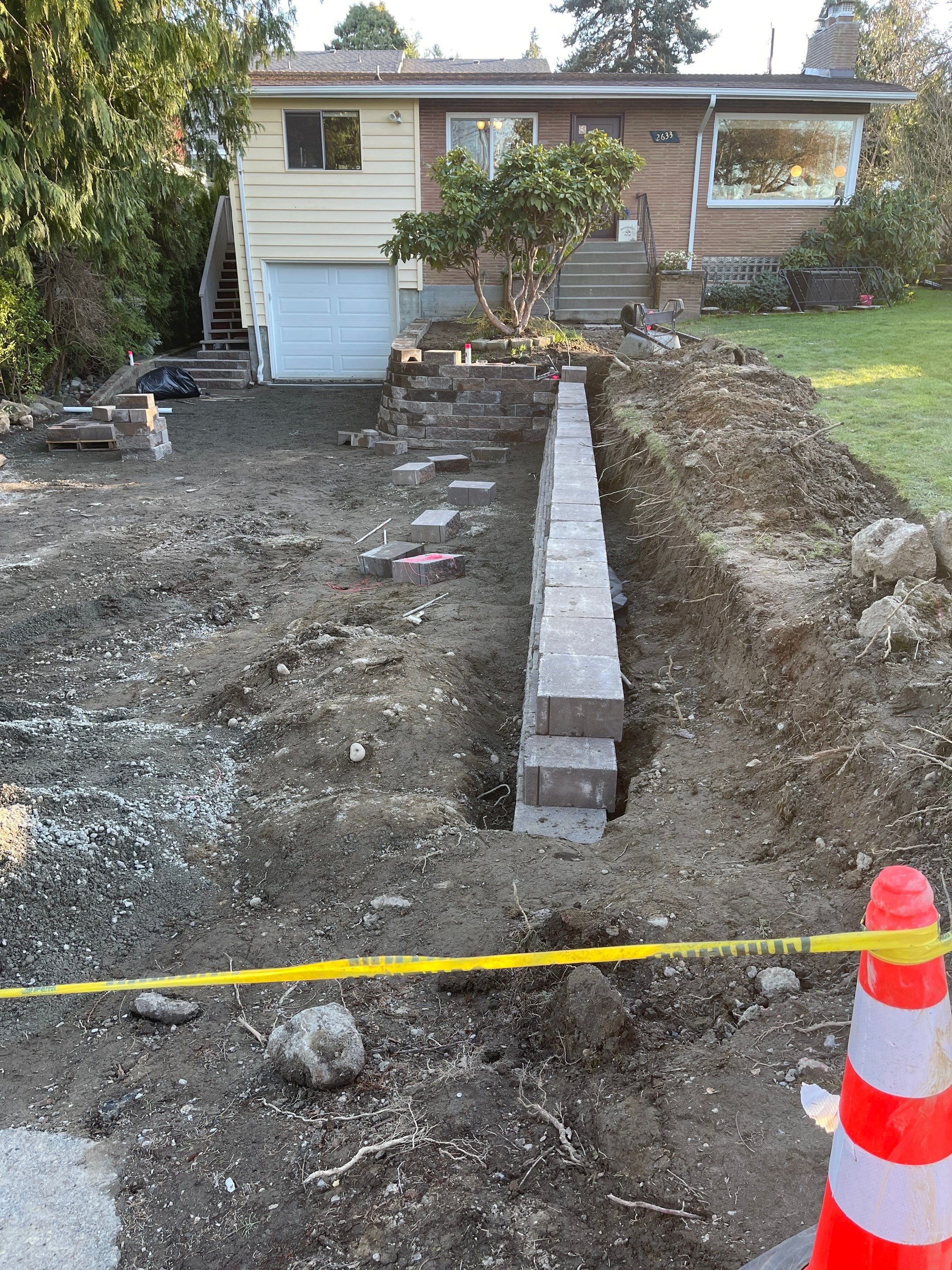 Lorra | Asphalt Driveway Repair & Retaining Wall by Jireh Asphalt & Concrete Inc 
