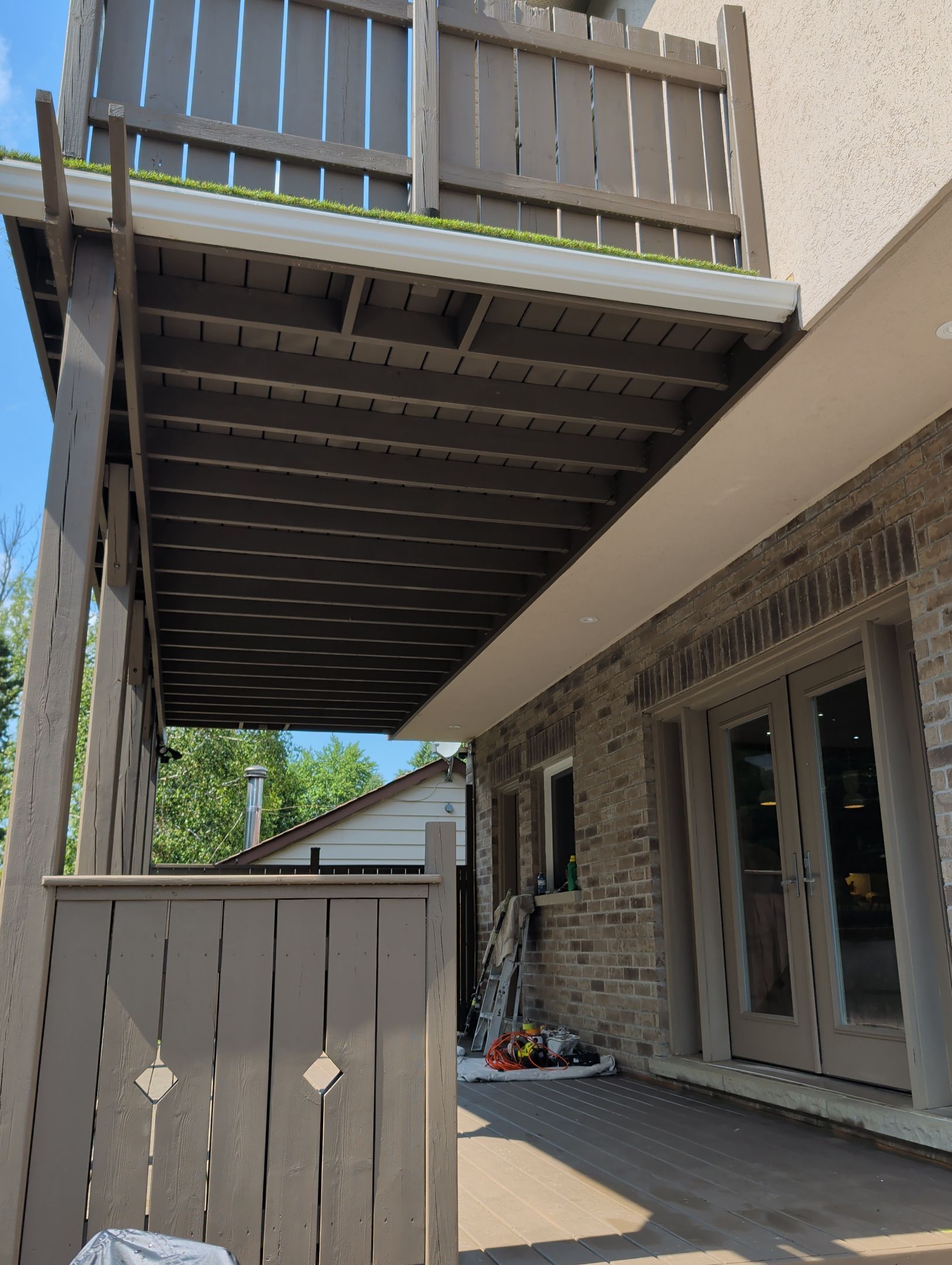Multi-Level Deck Restoration and Glass Railing Installation in King by GTA HOME PAINTING