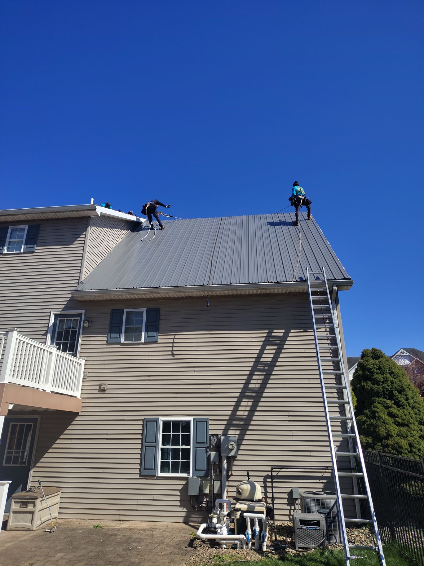 Residential Roofing Installation using Everlast Azm Panel -charcoal by Teflon Roofing