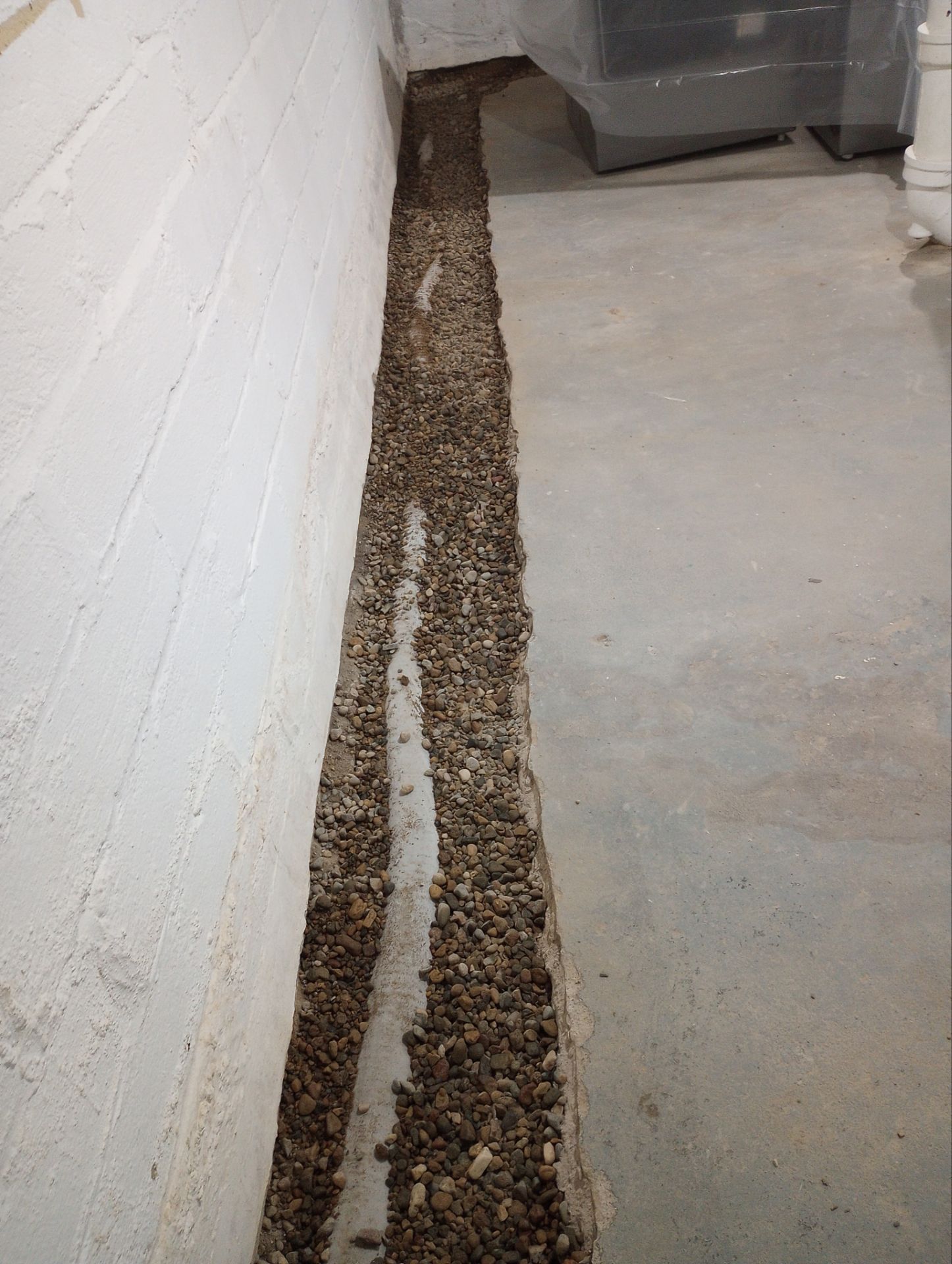 Interior Drain Tile & Wall Drainage in Northeast Minneapolis by Waterproofing Northeast