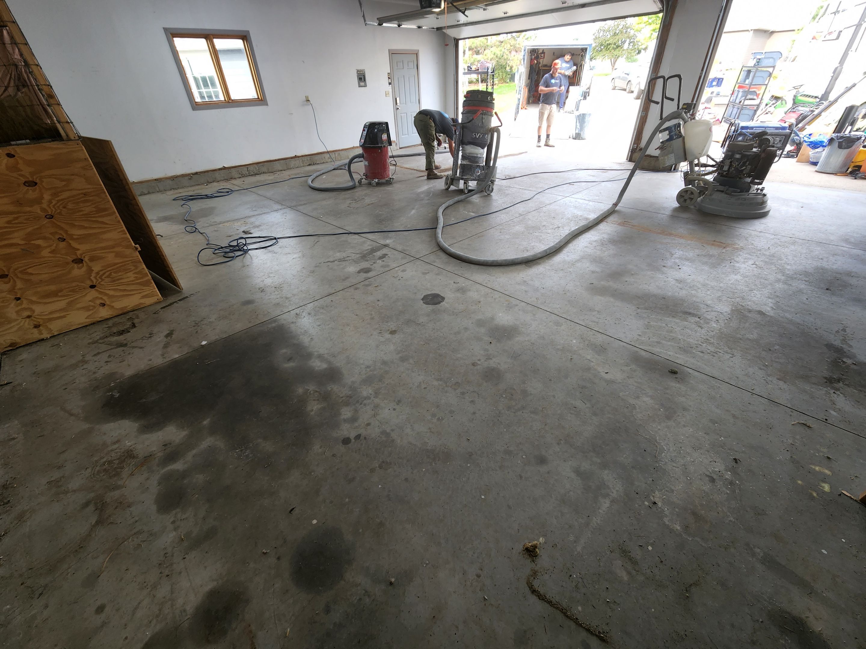 Garage using Slate Stone by Select Painting, Coatings & Garage Cabinets