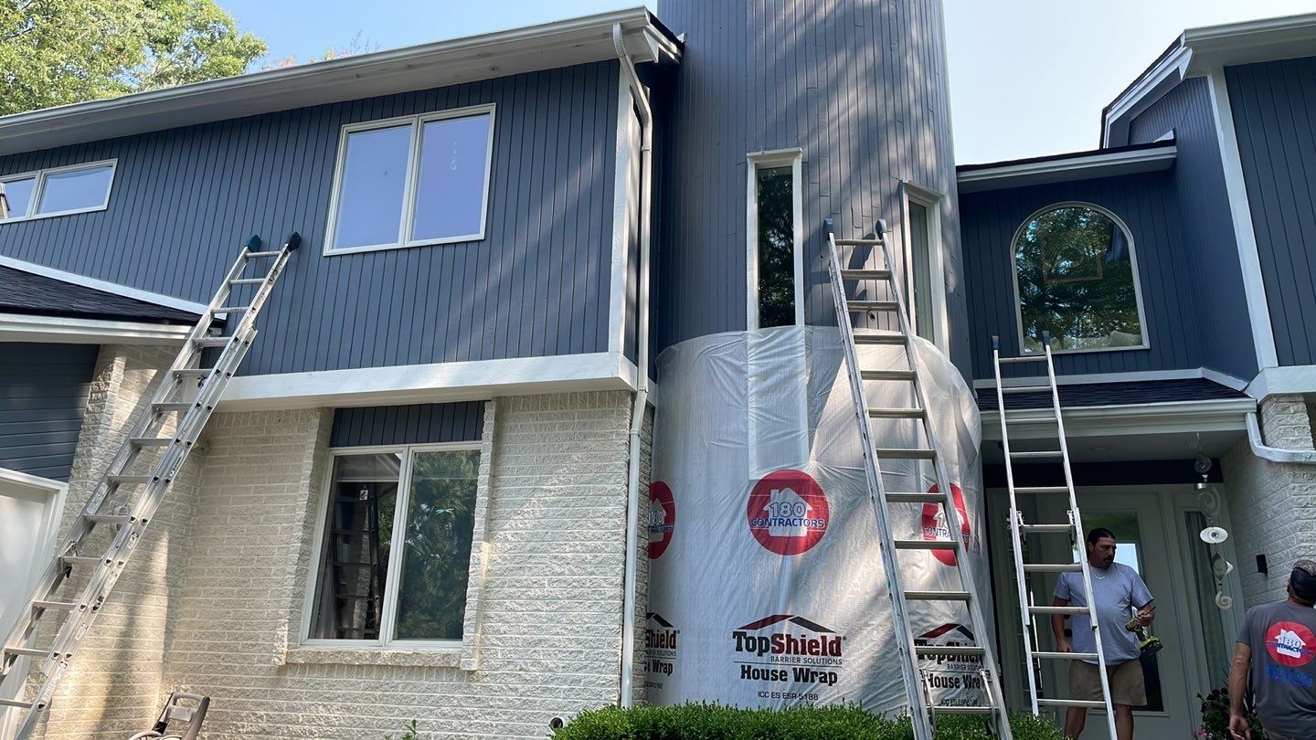 Siding Replacement using CertainTeed Board & Batten Pacific Blue by 180 Contractors