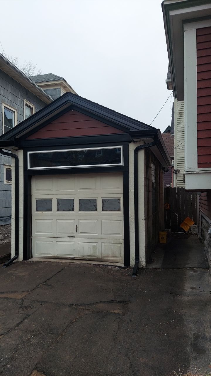 Exterior Renovations- Siding, Stamped Concrete, Porch, and Railings by Ivy Lea Construction