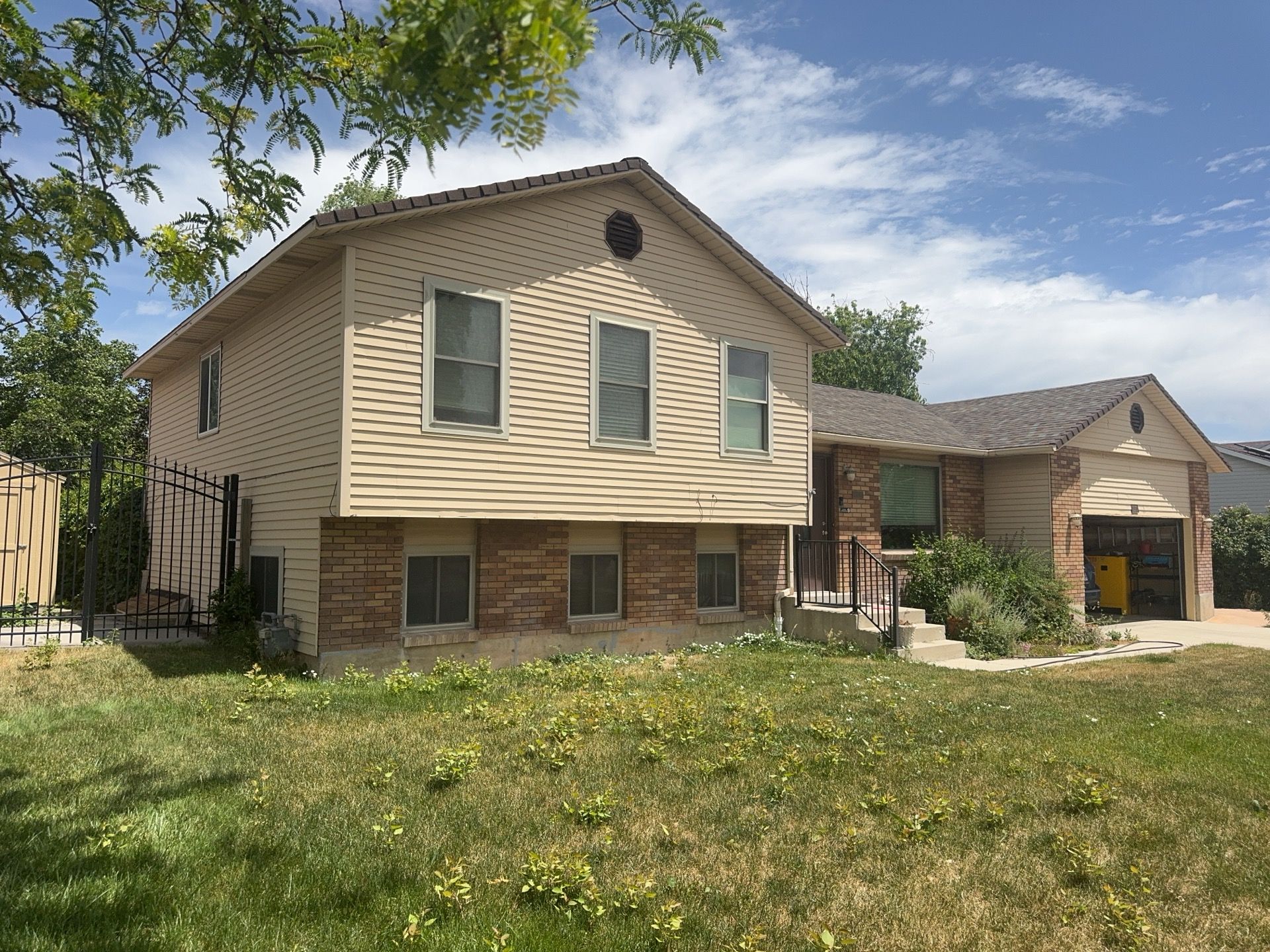 West Jordan | Hardie Lap Siding w/ Brick Accent | Boothbay Blue & Cobble Stone by Ideal Siding Utah