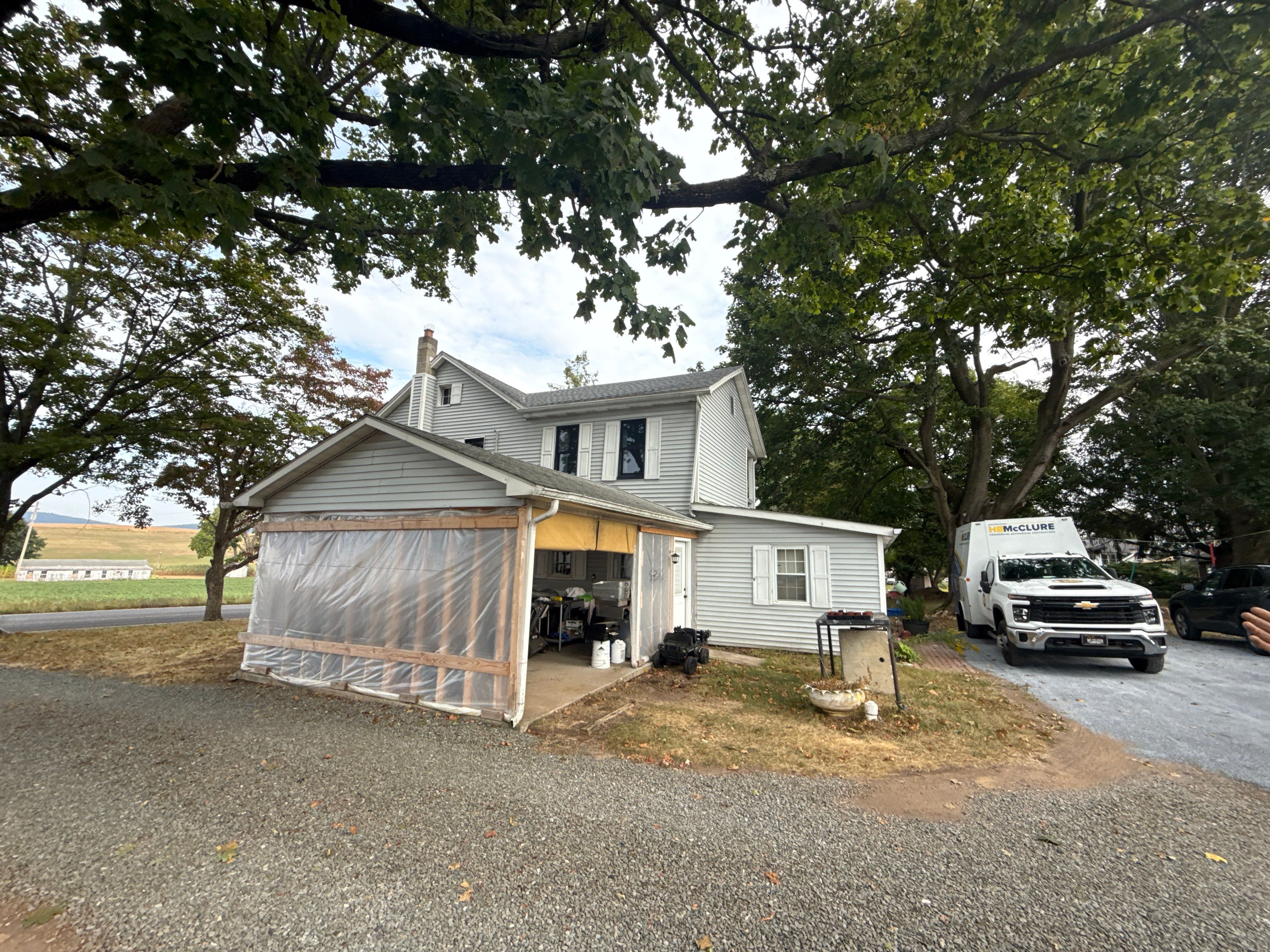 Carport Enclosure with Metal Siding and Roofing in Halifax by Esh Builders