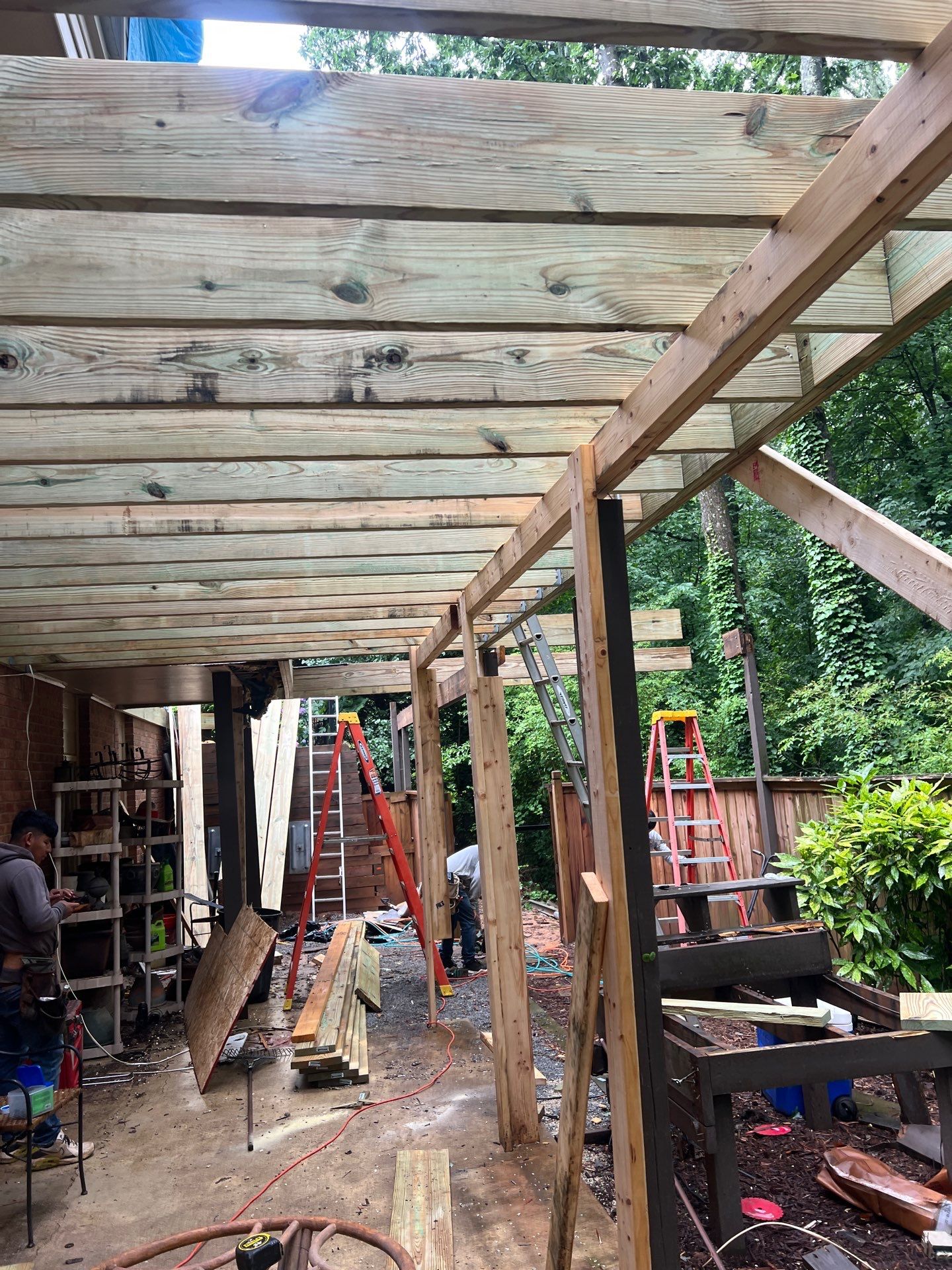 Deckorators Voyage Deck and Shed Style Covered Porch Build with Drink Rail by Nelson Exteriors 