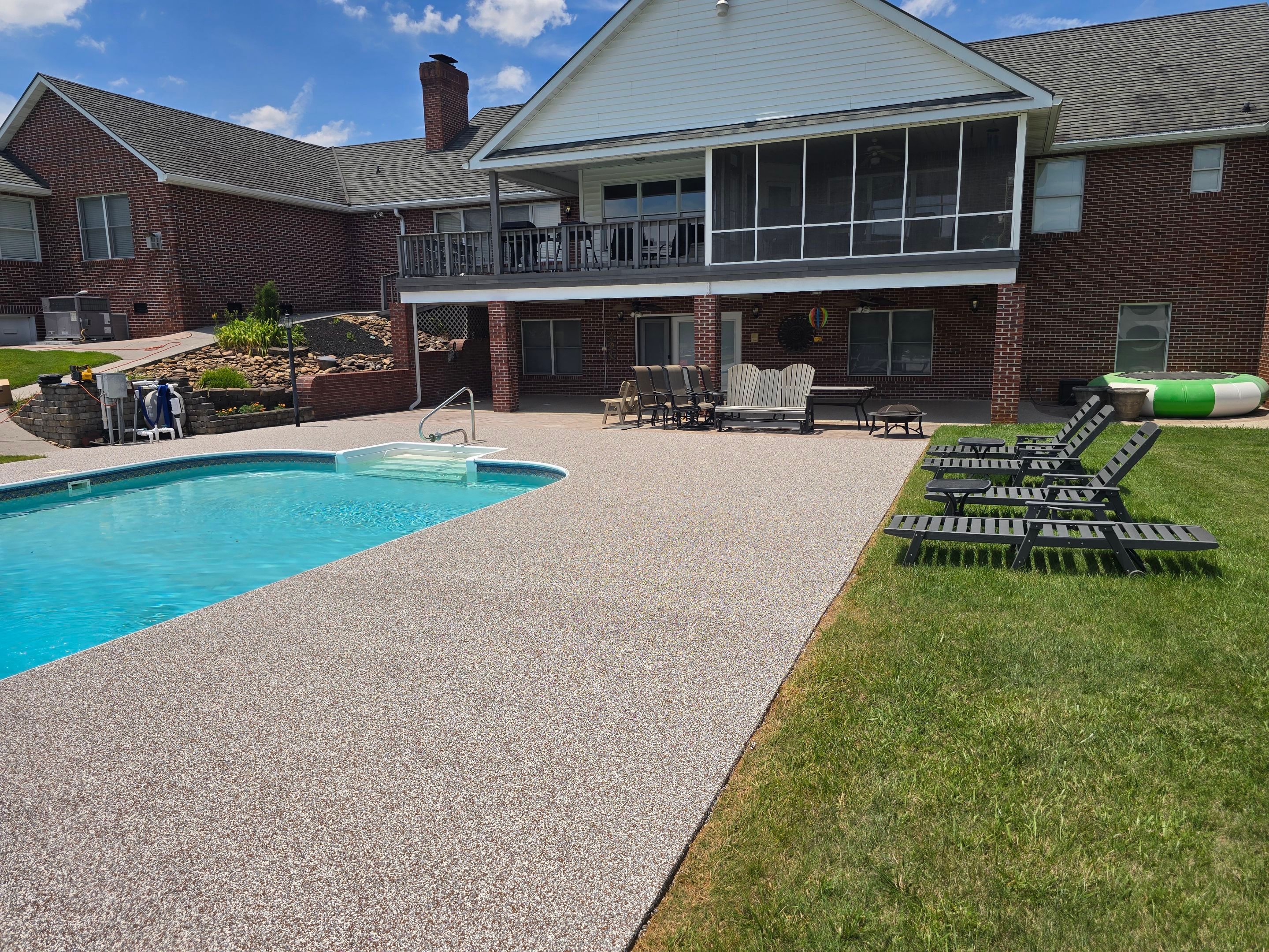 Pool Deck and Porch Using Brownstone and Coldwater Canyon by Elite Floor Solutions
