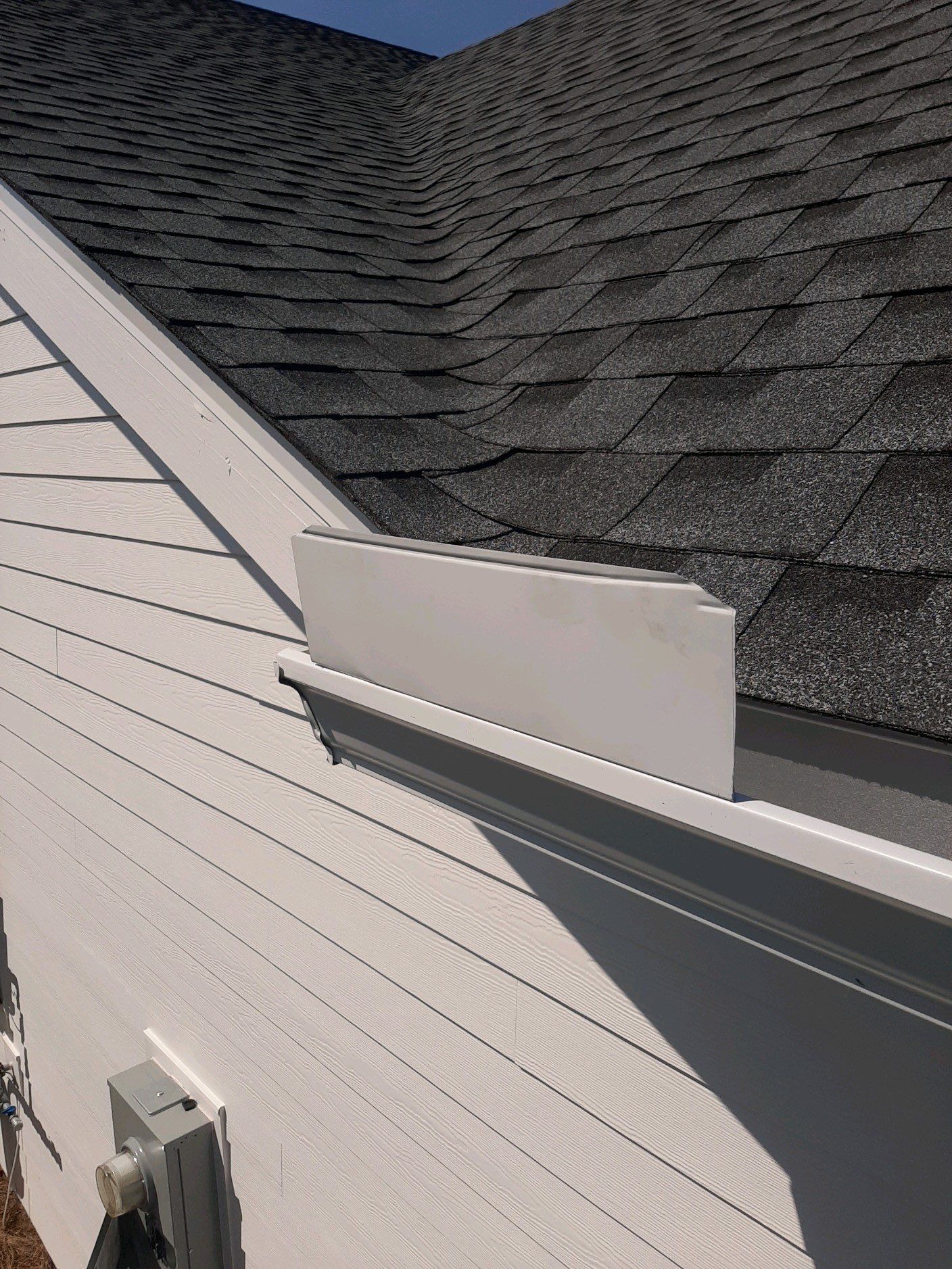 Gutter Installation Using White K-Style Aluminum Seamless Gutters by Gutter Professors