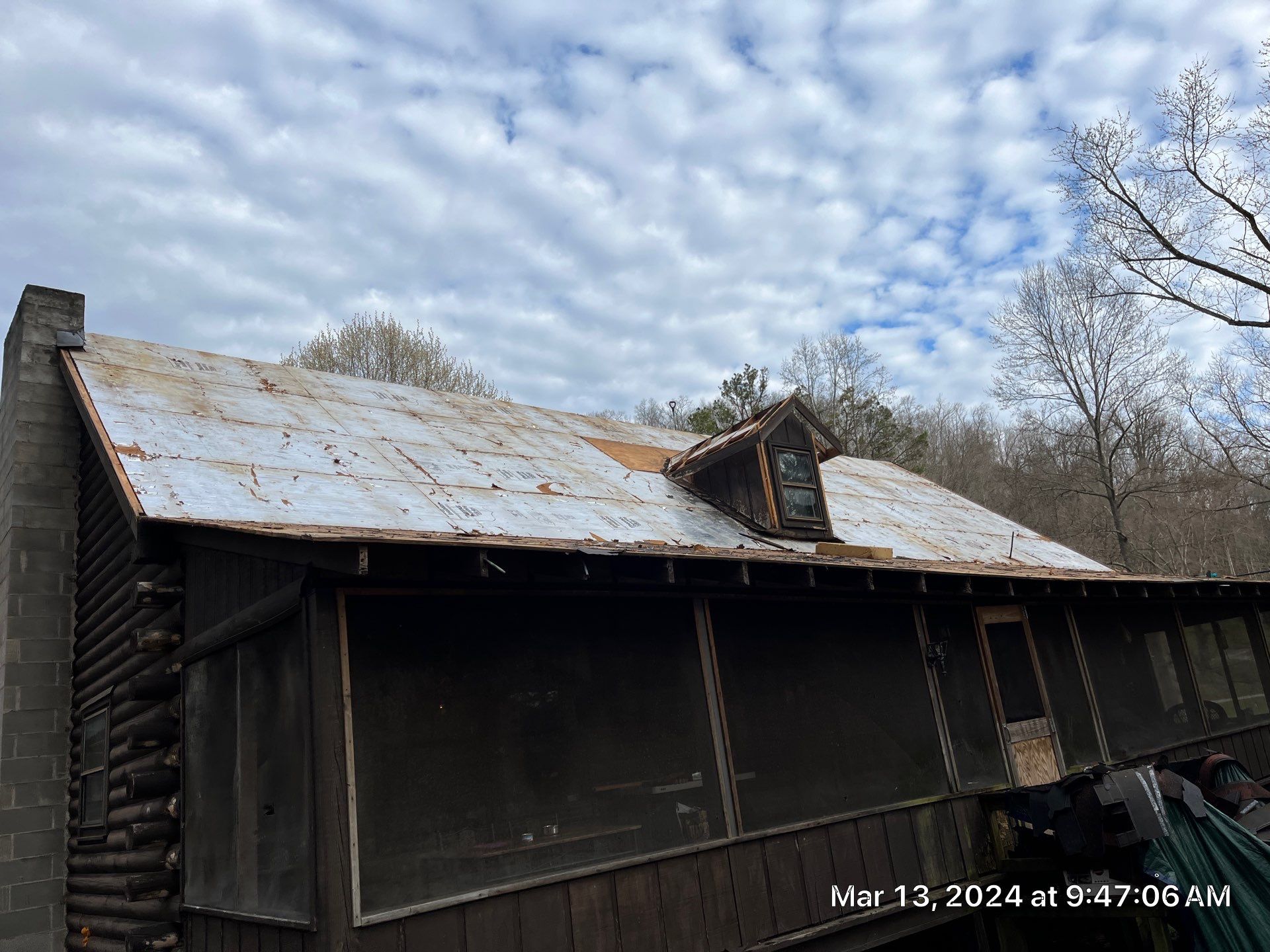 Residential Roofing Installation using Union Corrugatting Metal Roofing and Seamless Gutters by Fahey Roofing + Contracting
