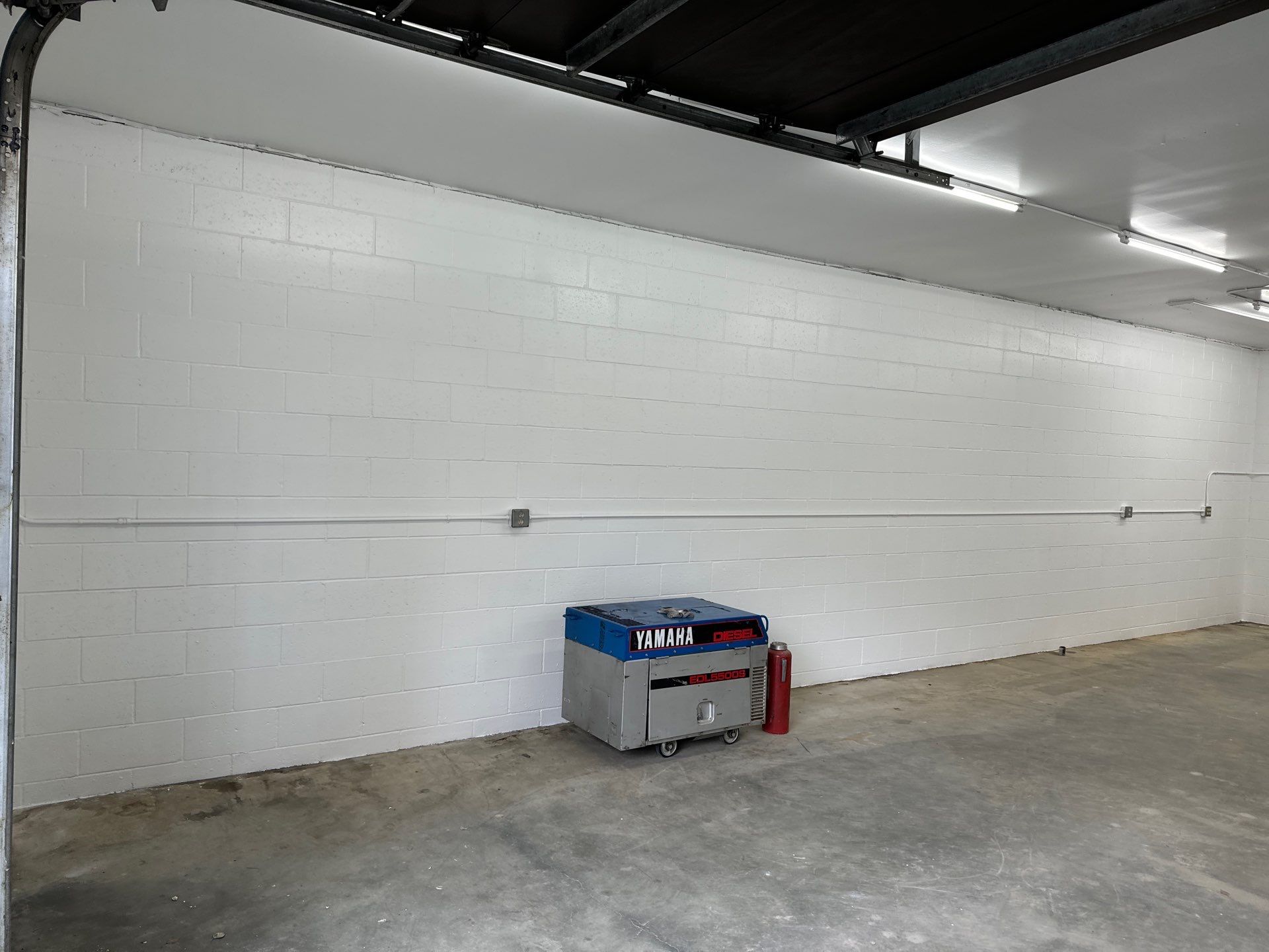 Garage Gets A Fresh Look by Midnight Sun Painting
