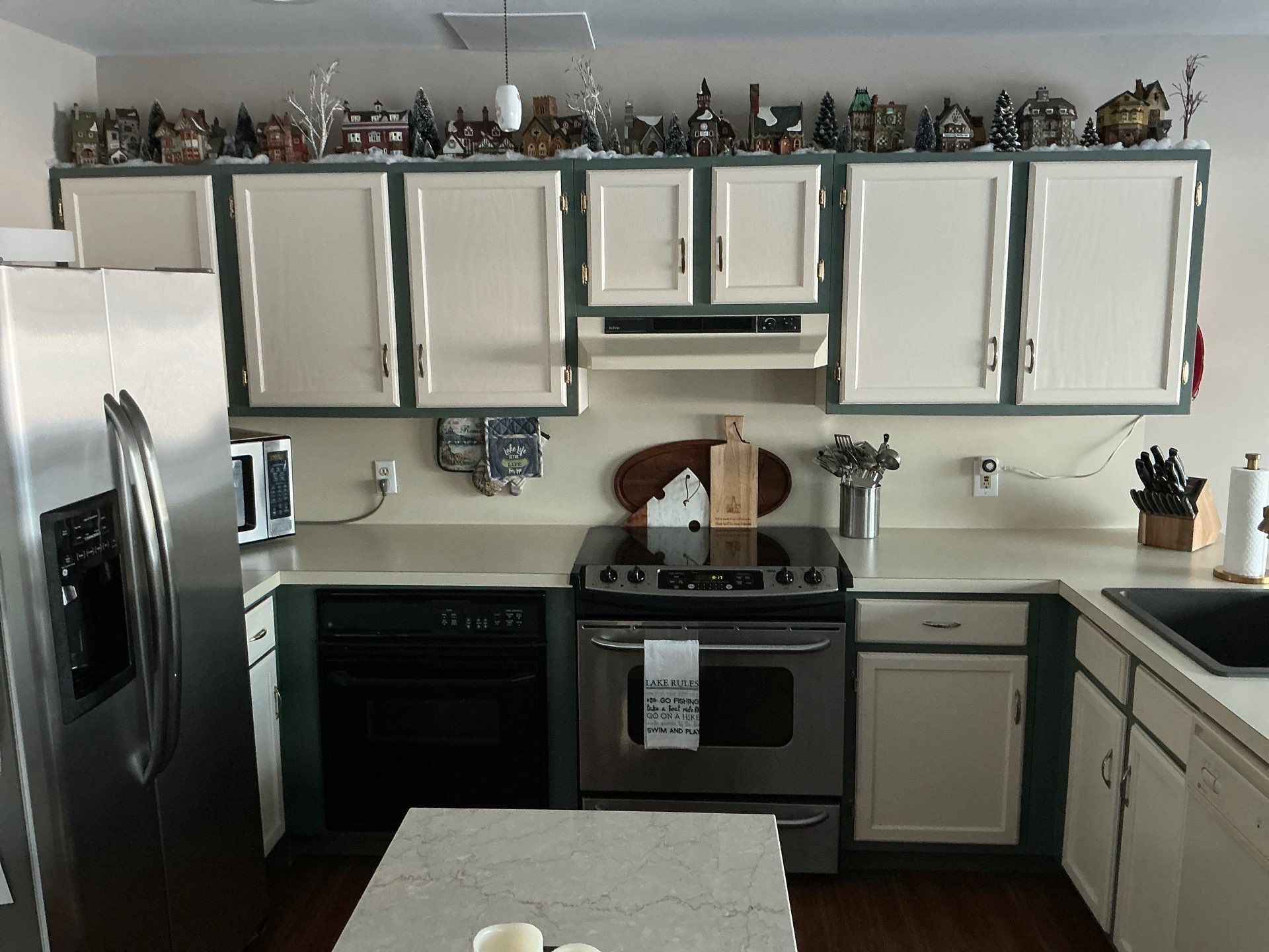 Blue-Grey Kitchen Cabinet Refinishing Transformation in White Lake by Top Shelf Painter