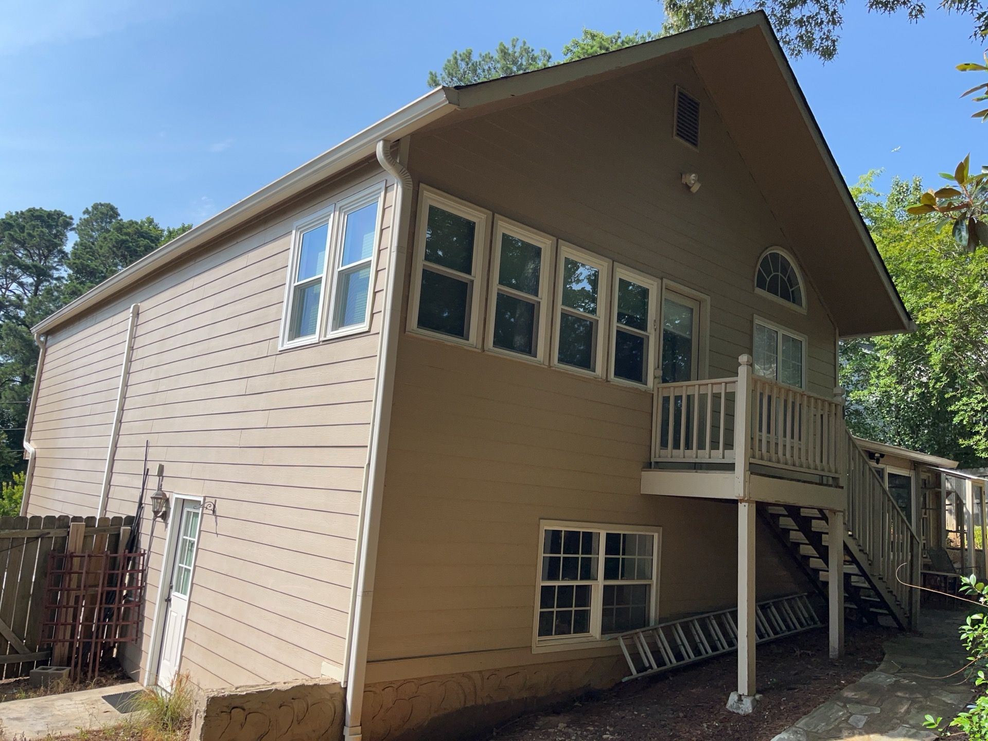 Rotted Wood Replacement, Deck Stain, and Exterior Paint Project in Kennesaw, GA by Nelson Exteriors 