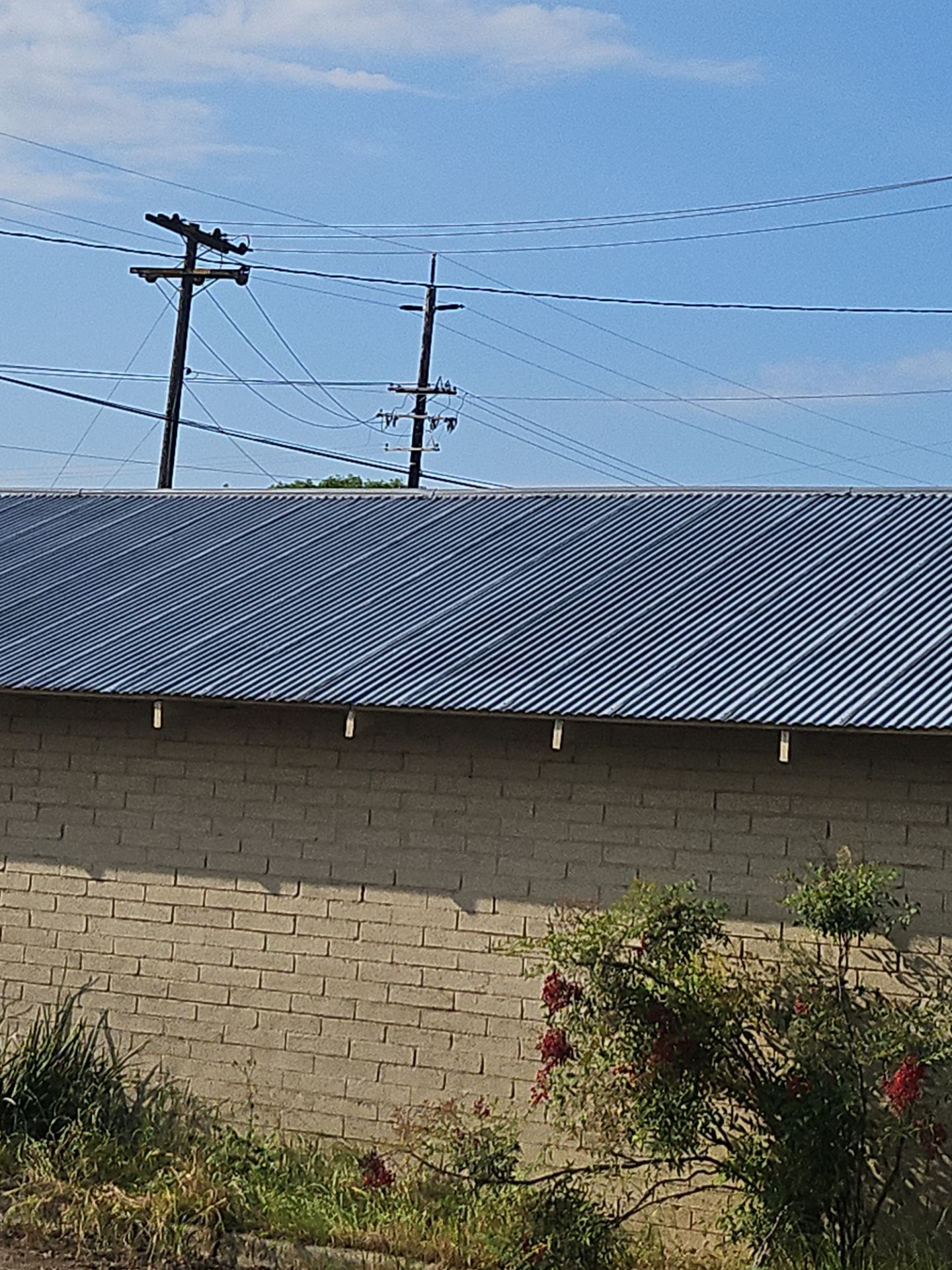 Spray foam and coatings using Conklin Benchmark/PUMA XL by Straight Edge Roofing Inc