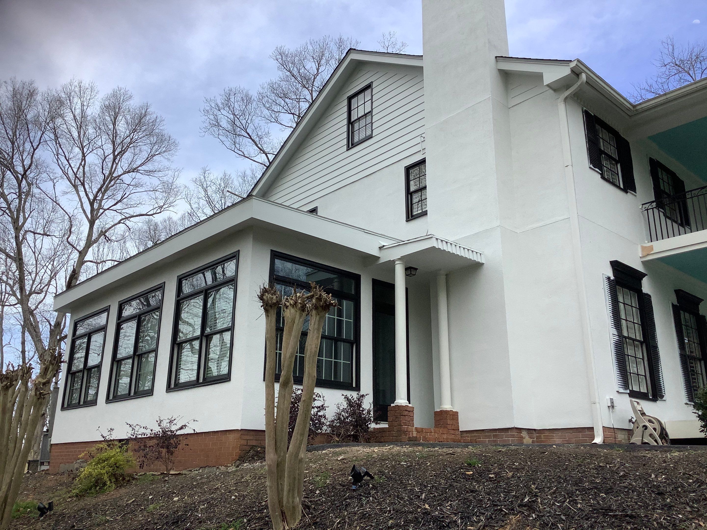 Full Exterior Repaint for Colonial Style Home in Cumming by Swift Home Renovations