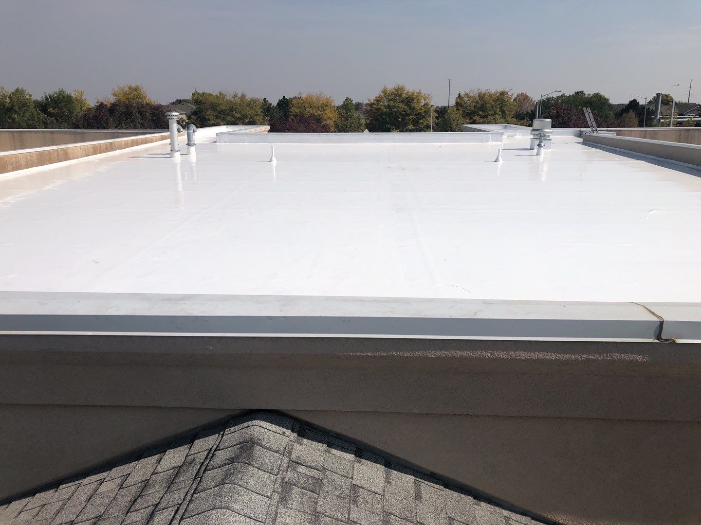 Commercial Roofing Installation using American Standard Coating - S  by A to Z Roofing