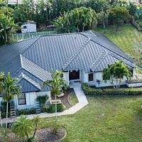 24ga 1.5" Mechanical Seam Dark Bronze by Total Roofing System The Metal Roof Experts