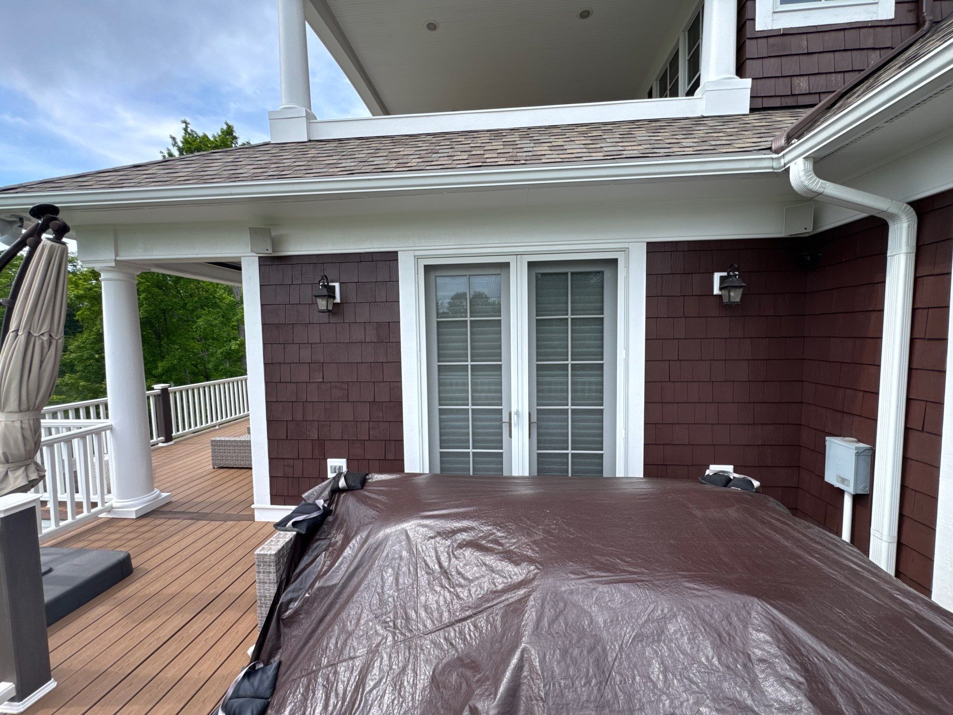 Sunesta Retractable Awning Installation in Harbor Springs by Rainbow Seamless Systems