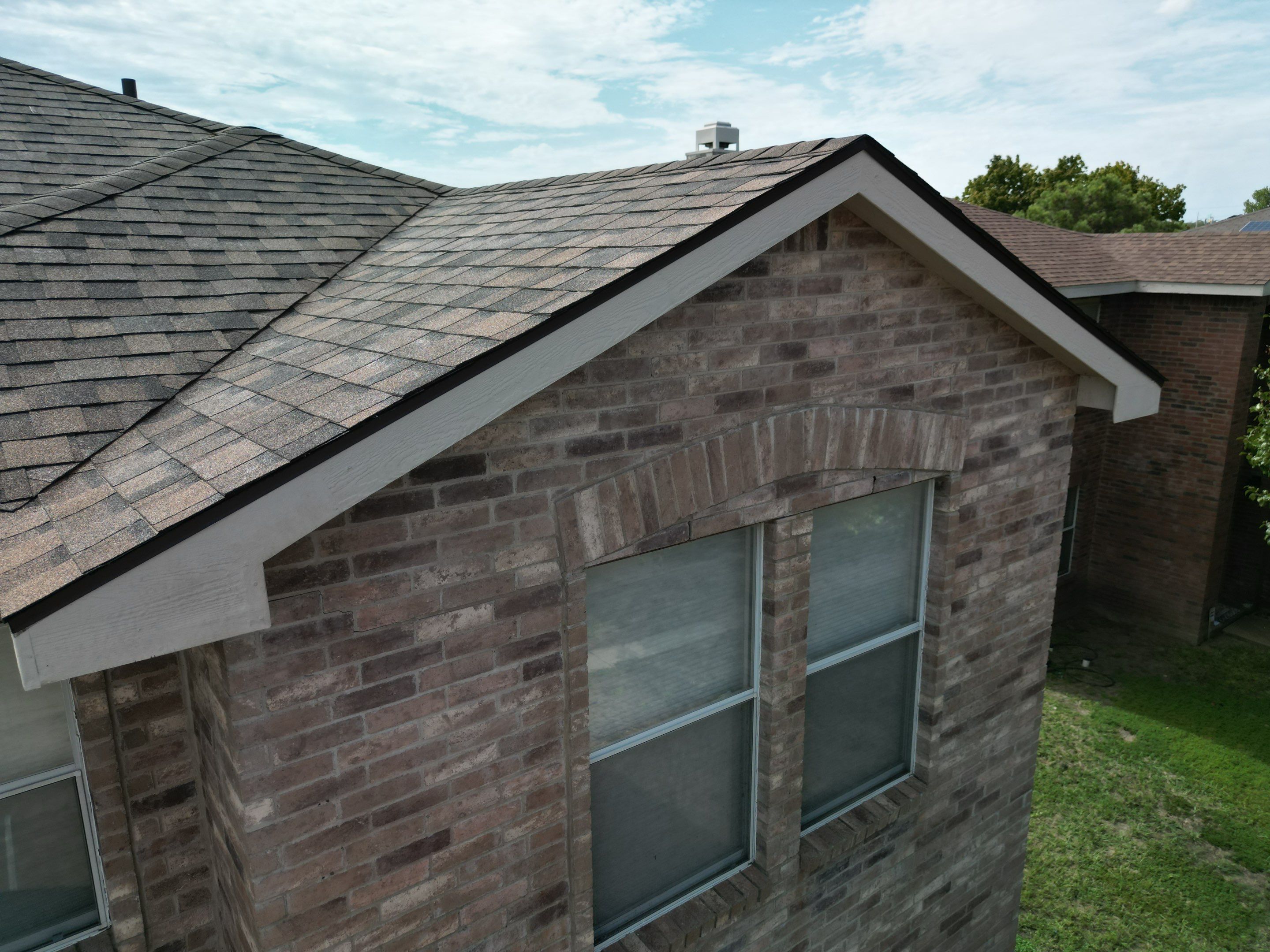 Full Roof Replacement, Chimney Rebuild and Interior Damage Replacement by First United Roofing & Construction