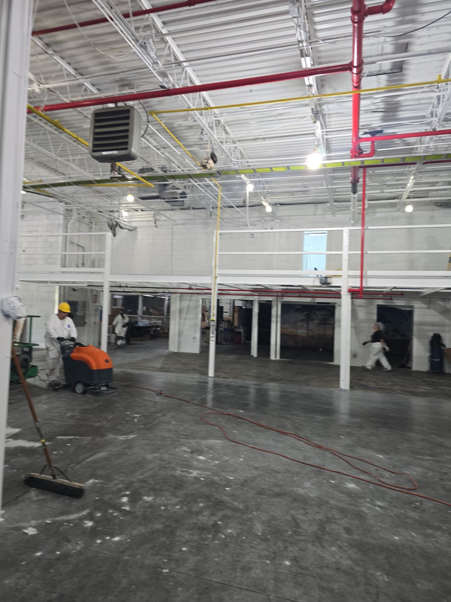 Industrial Warehouse Fire Damage Cleaning and Spray Sealing in Islandia by EMS Restoration Corp