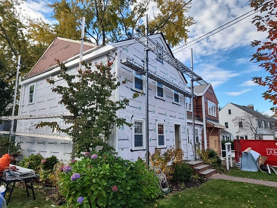 Siding and Roof for house with new addition in Milton, MA by UBrothers Construction