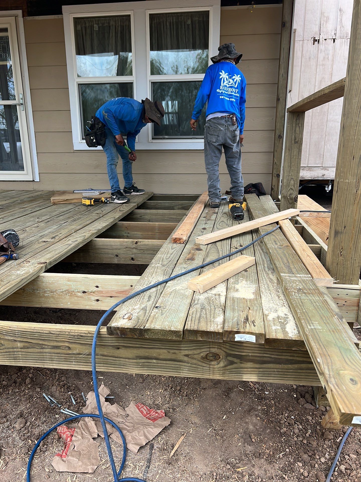 Front Porch Sitt'n by Bayfront Roofing and Construction