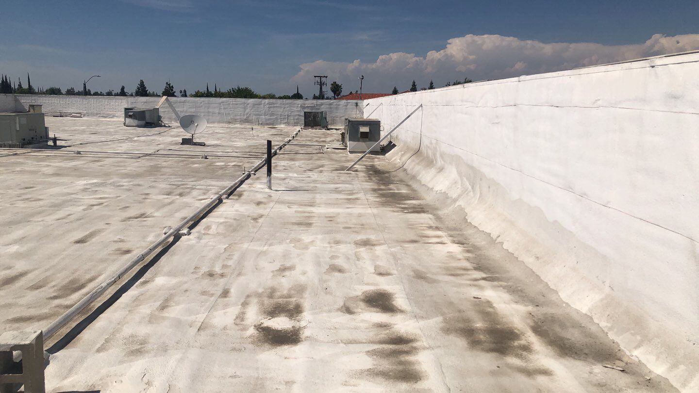 Reburbish existing spray foam job by Straight Edge Roofing Inc