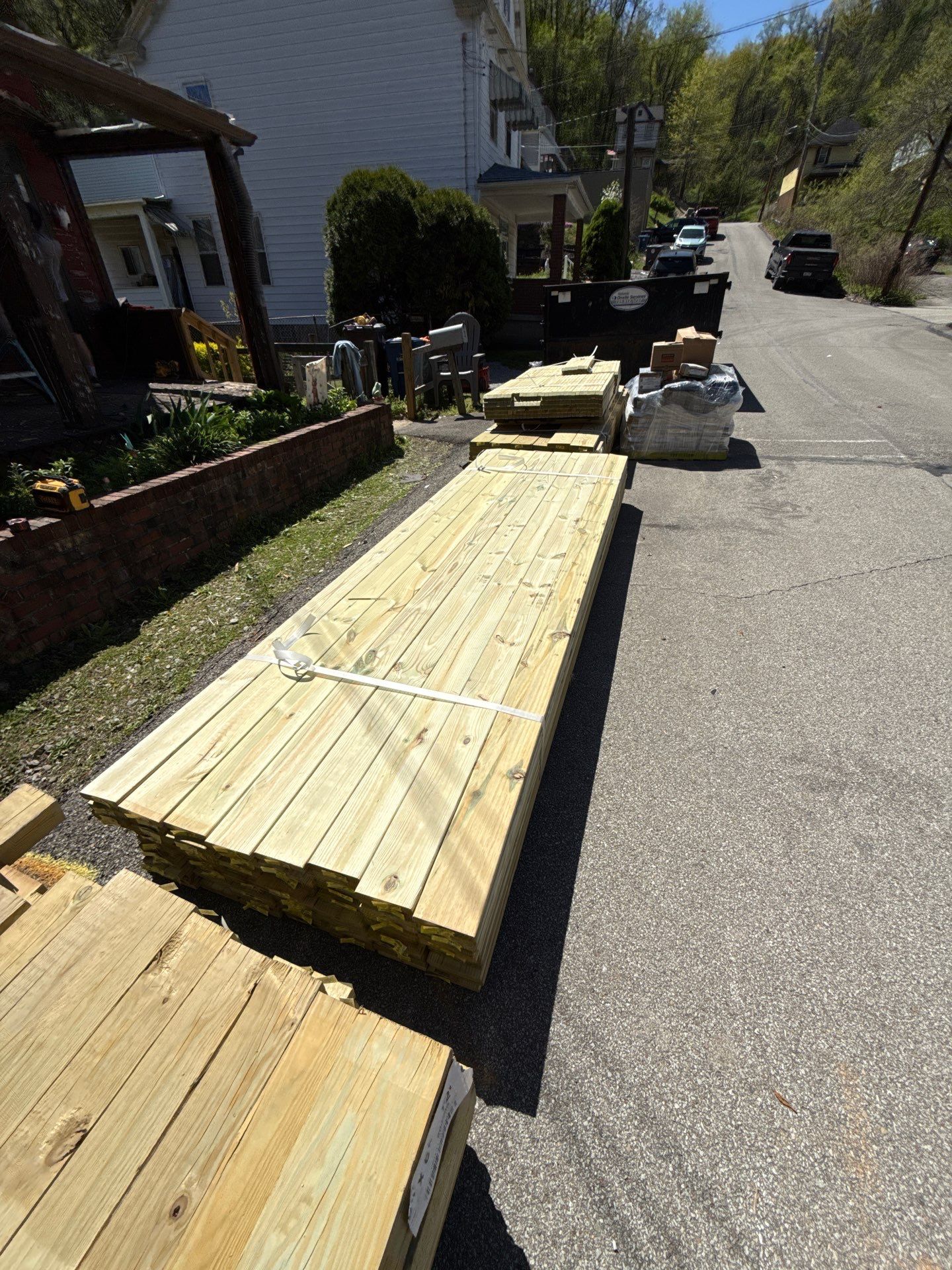 Roof sunspace deck  by Cousins Roofing Siding & Decks