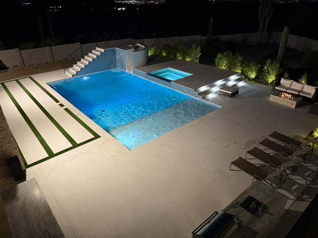 Pool and spa build with slide & outdoor kitchen by Modern Pools