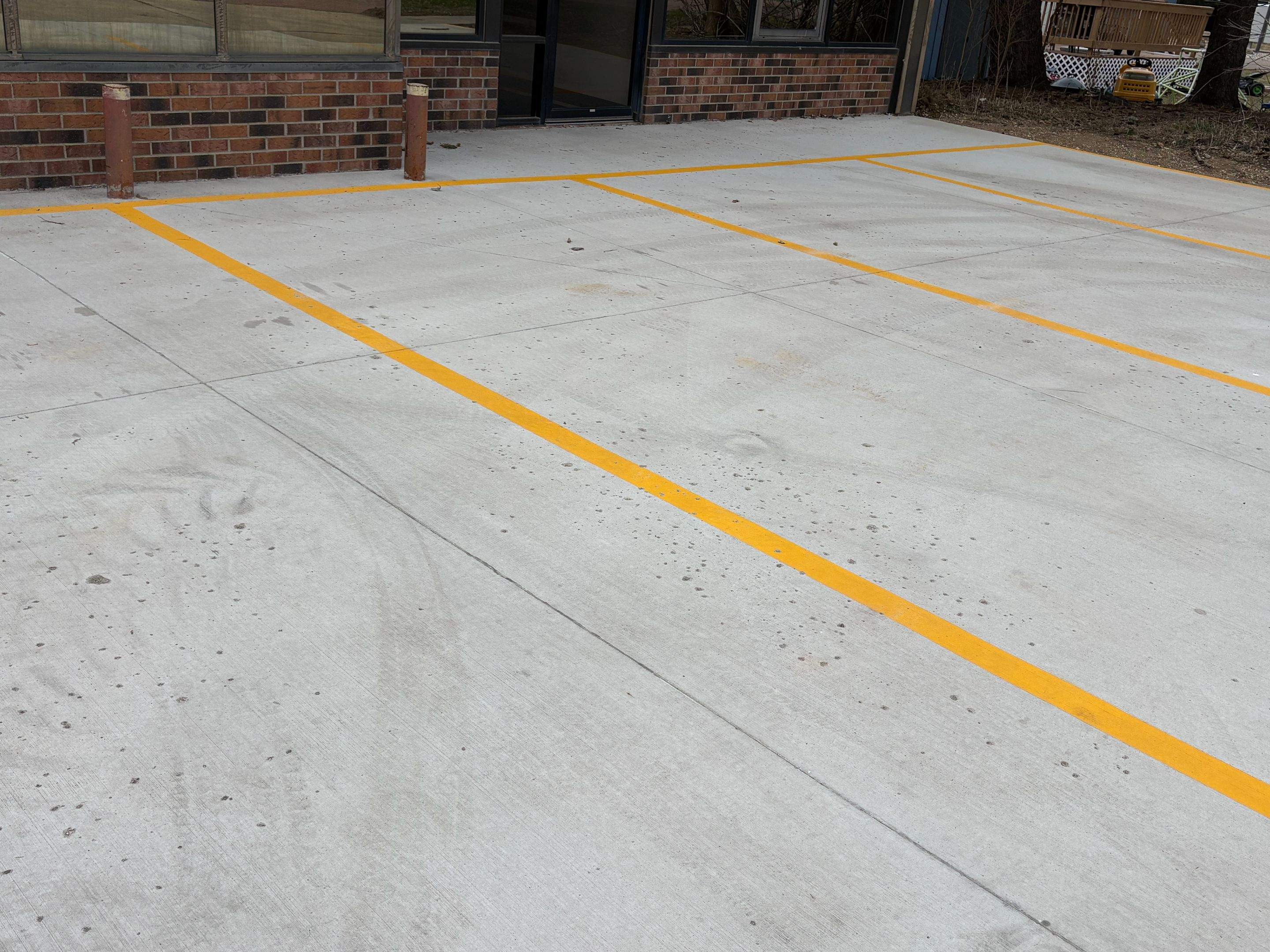 Commercial Shop Renovation and Concrete Parking Installation in Brookings by Select Painting, Coatings & Garage Cabinets