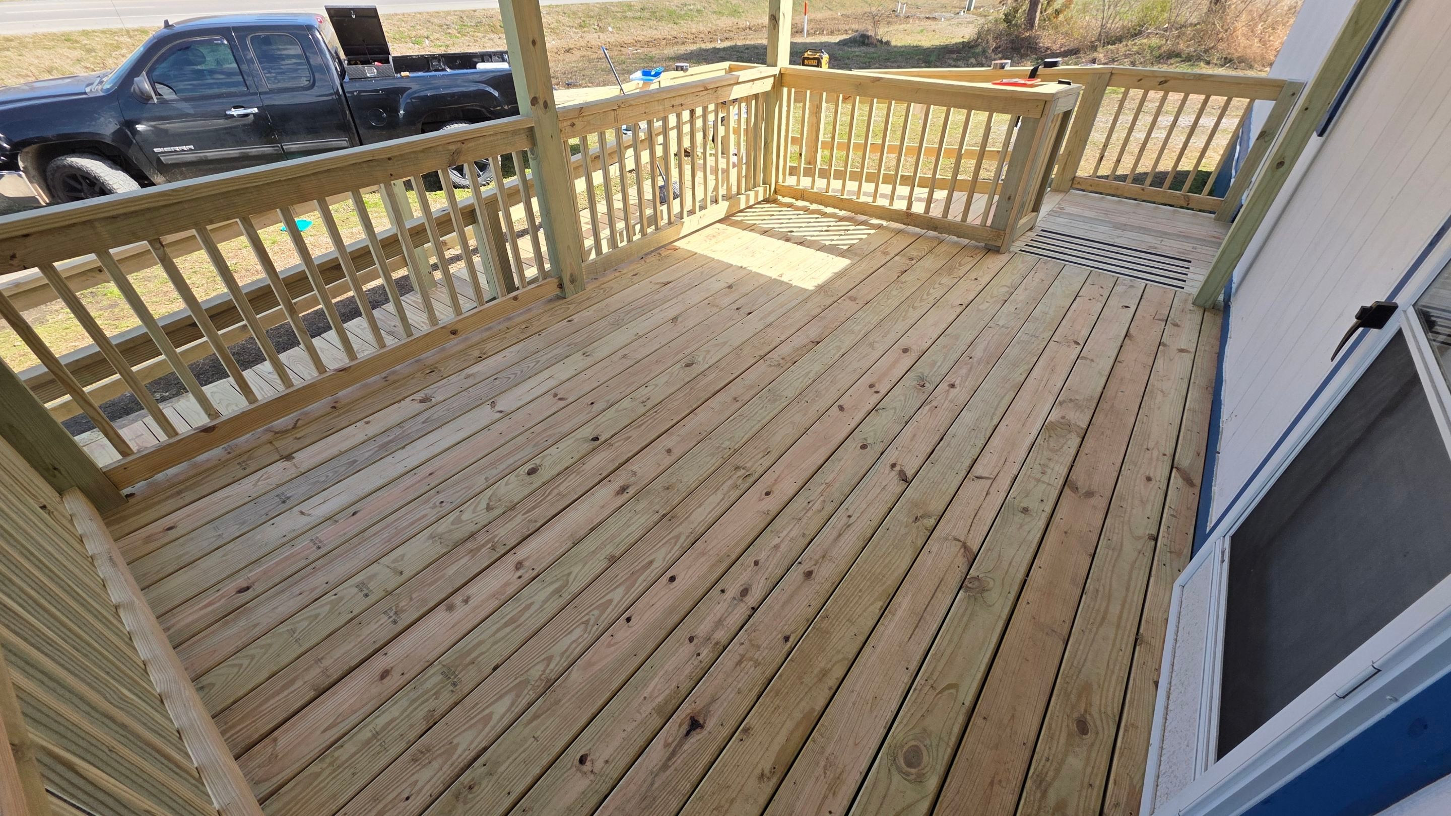 Covered Deck w/ ADA Ramp by In & Out Construction & Remodeling, LLC
