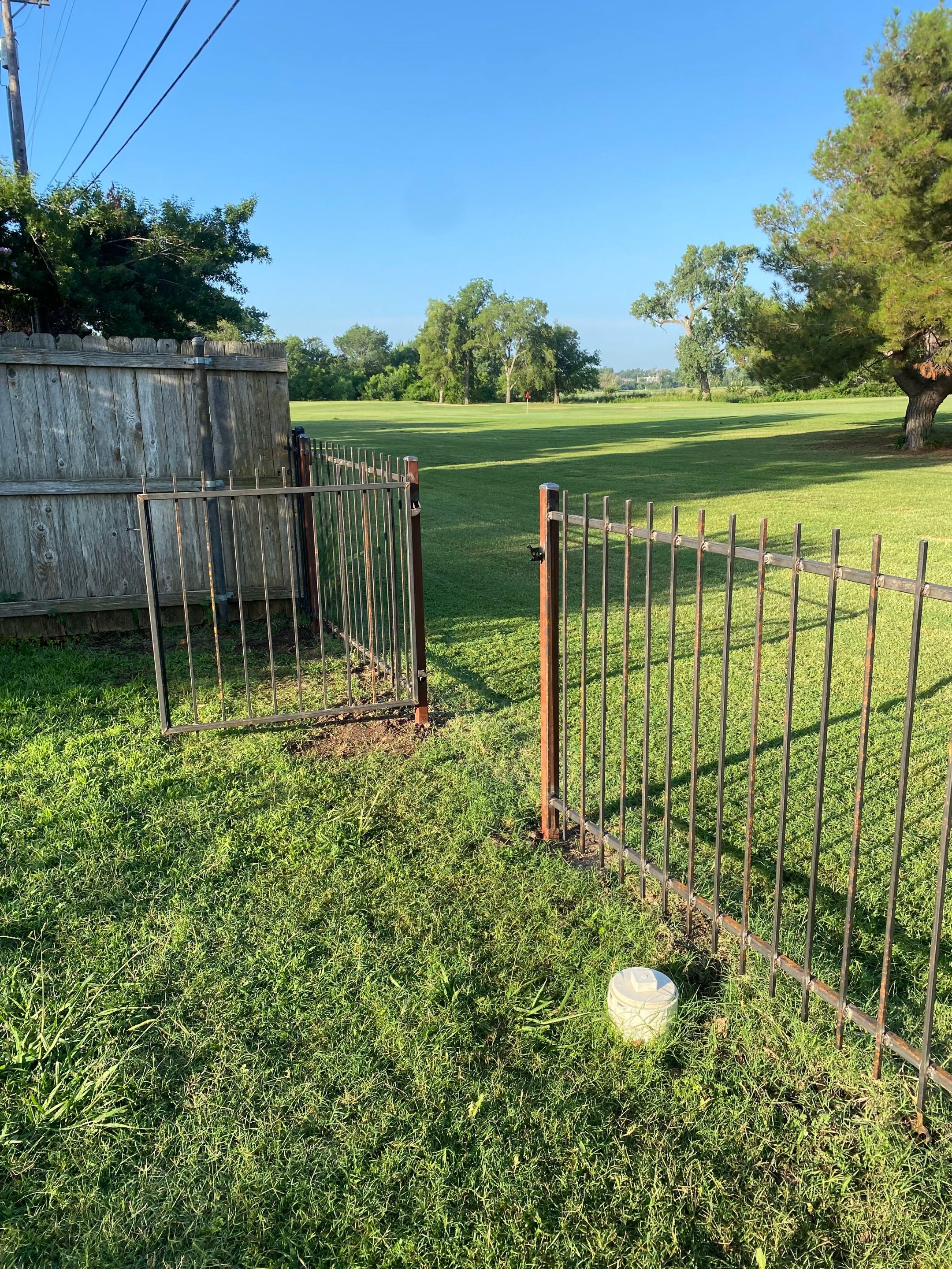 Custom Metal Fence Build by Clays Services Inc
