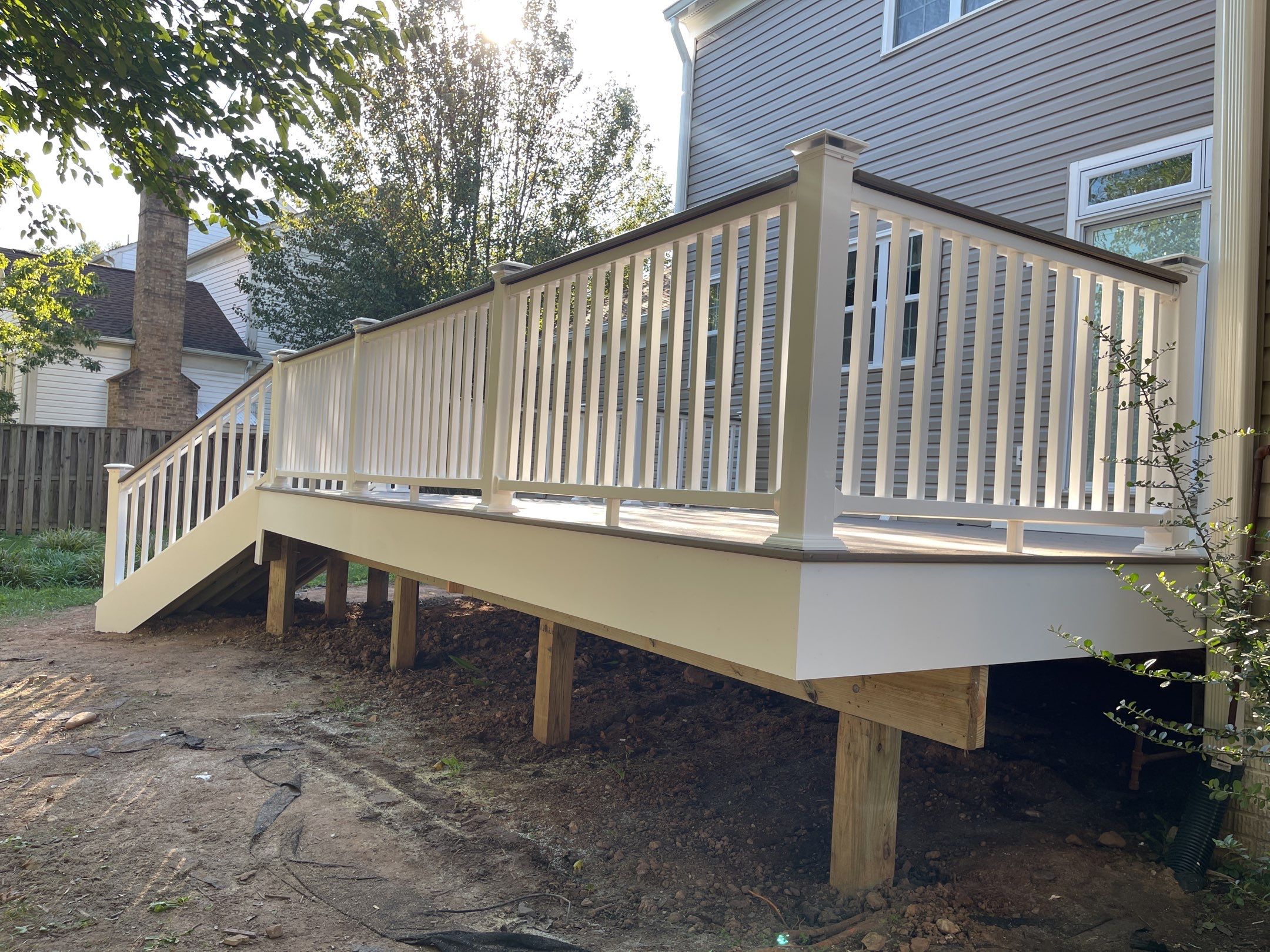 Deck Installation using Trex Rocky Harbor Decking by RJC General Construction, LLC.