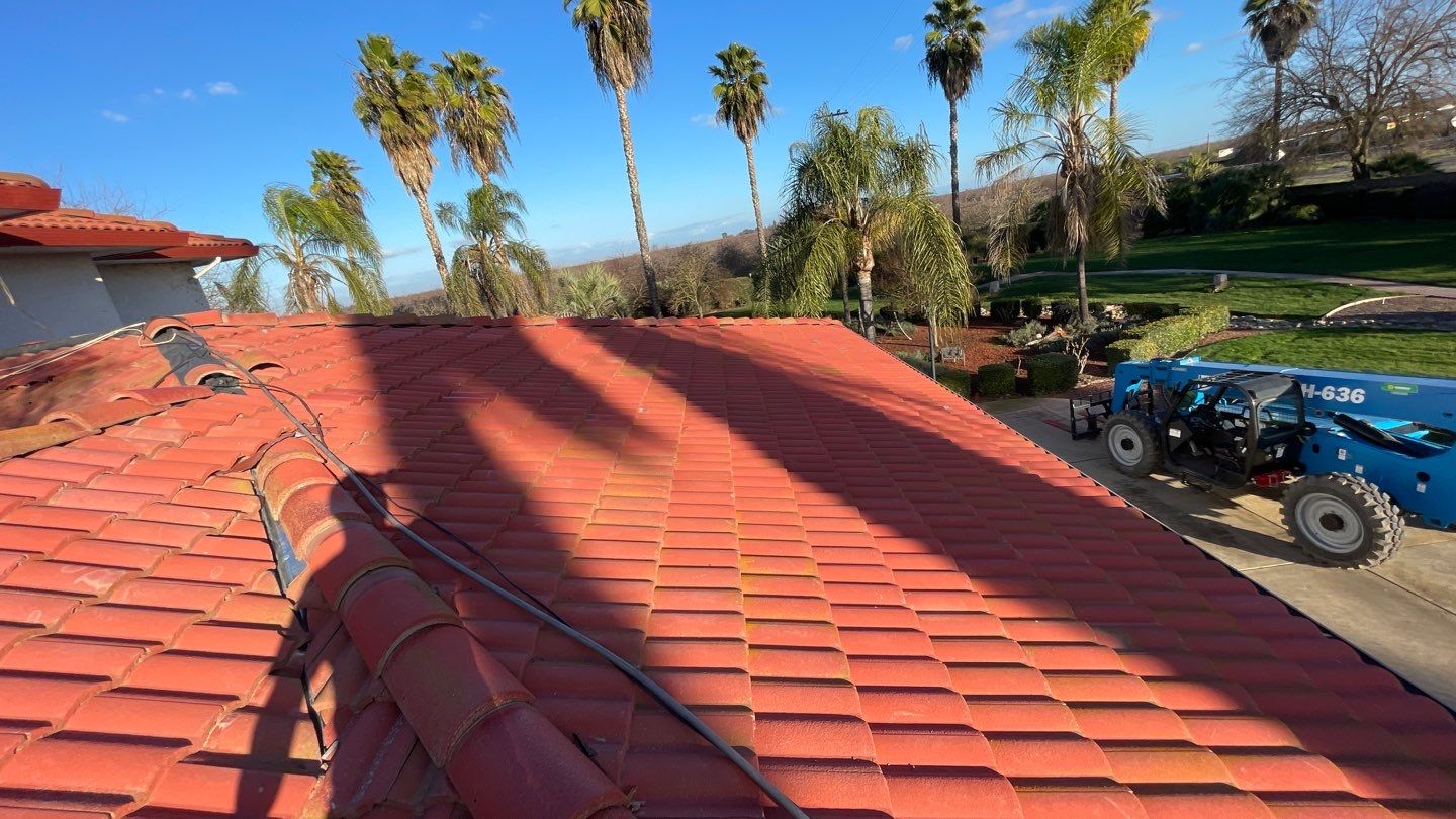 Tile refurbish project using existing tiles and replaced underlayment and battens by Straight Edge Roofing Inc