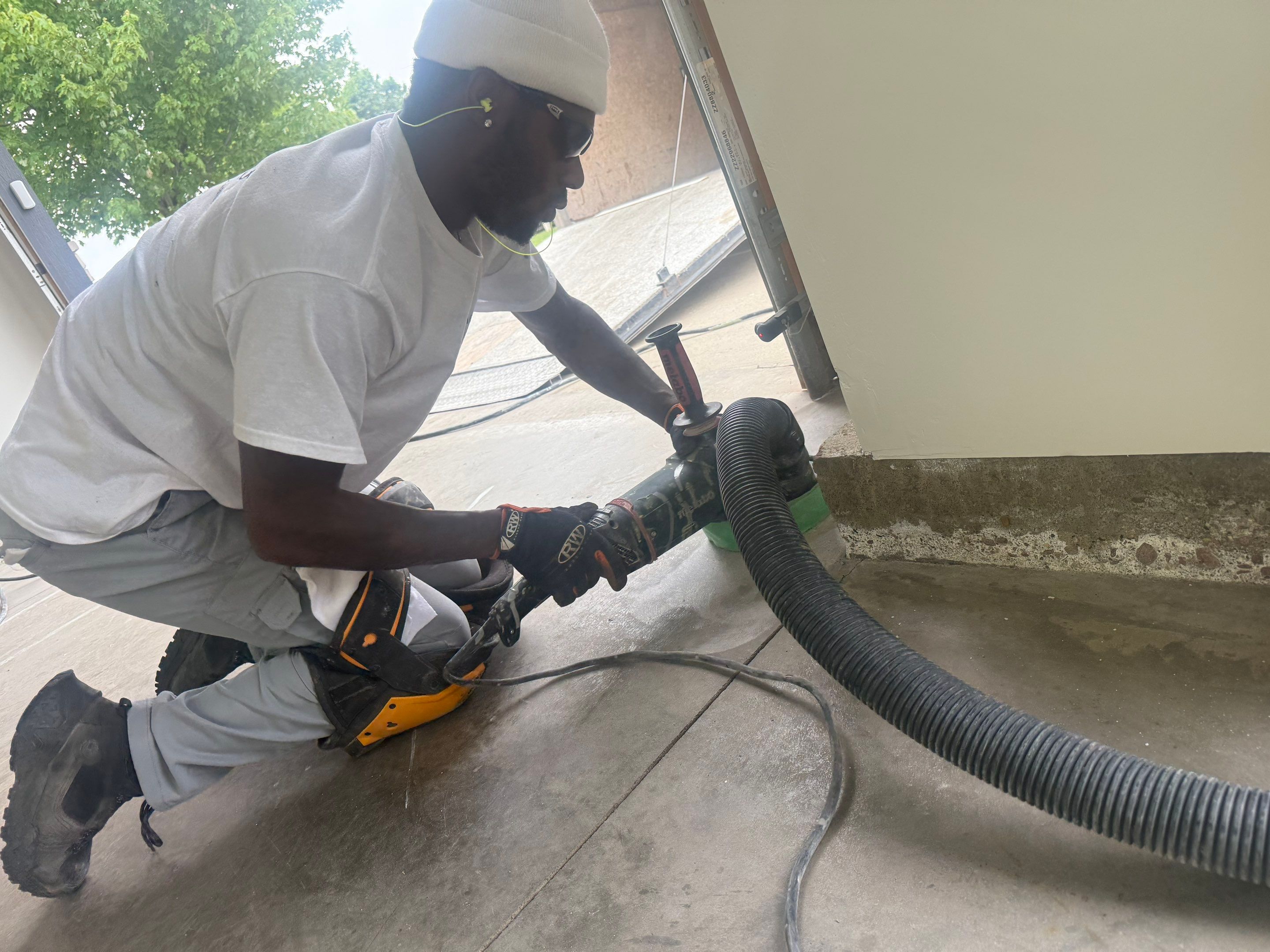 Full Garage Floor Resurfacing and Decorative Epoxy Flake Finish by Select Painting, Coatings & Garage Cabinets