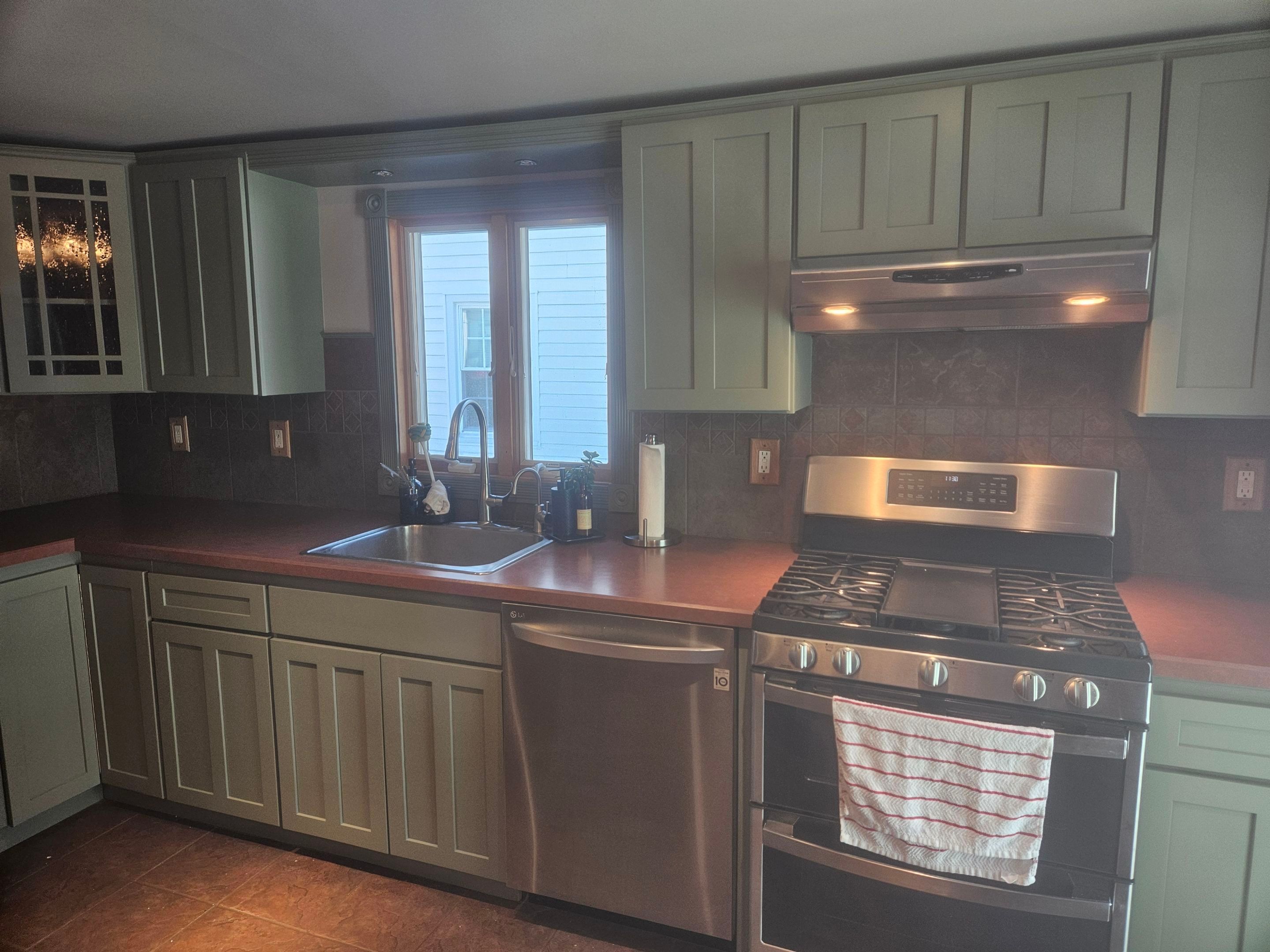 Cabinet Refinishing using Benjamin Moore Command Satin by Spectrum Painting, LLC