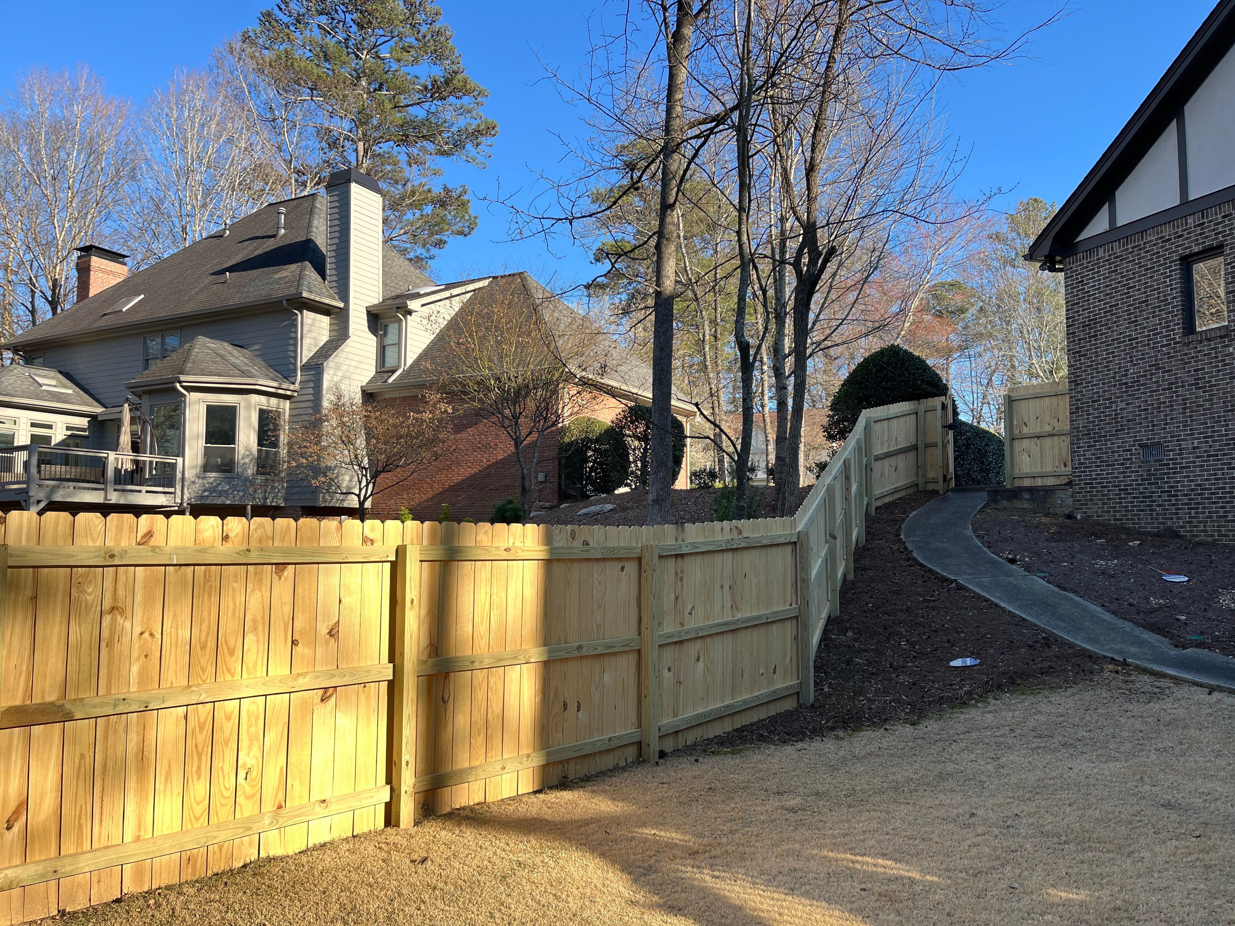 Deck and Fence Stain with Deck Board Repairs in Atlanta, GA by Nelson Exteriors 