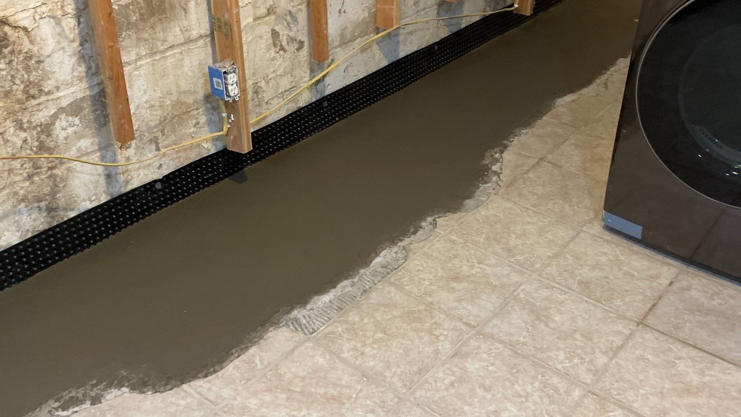 Drain Tile in Minneapolis for Kristen & Taylor by Waterproofing Northeast