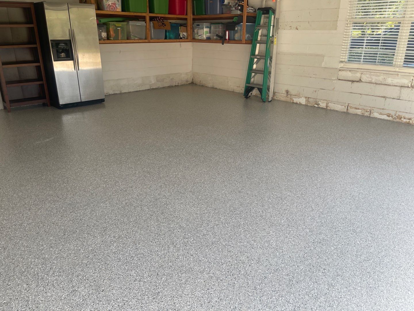 Garage with Cabinets in Gainesville, FL in Mount Everest by Cross Creek Concrete Coatings