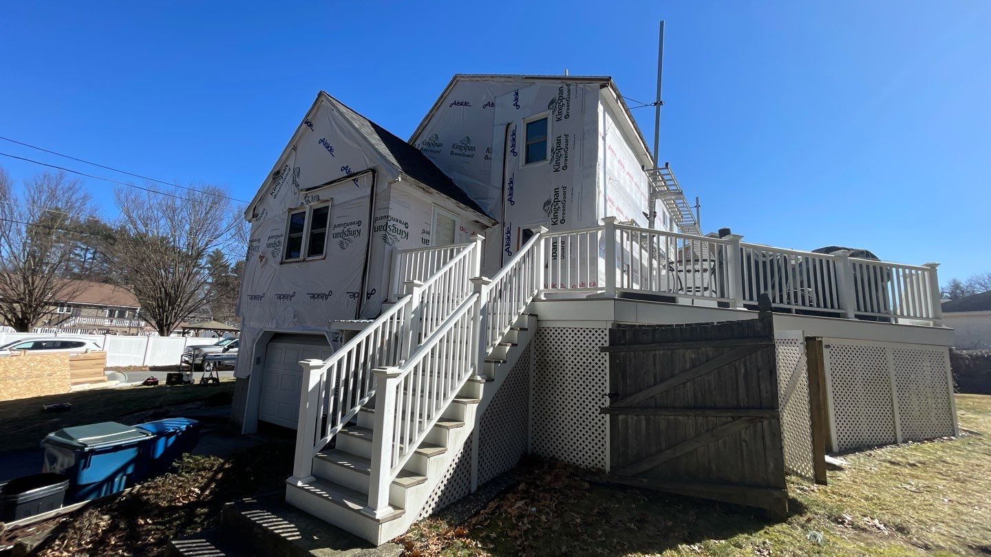 Complete Exterior Renovation with New Siding & Gutters   by Sensible Home Solutions