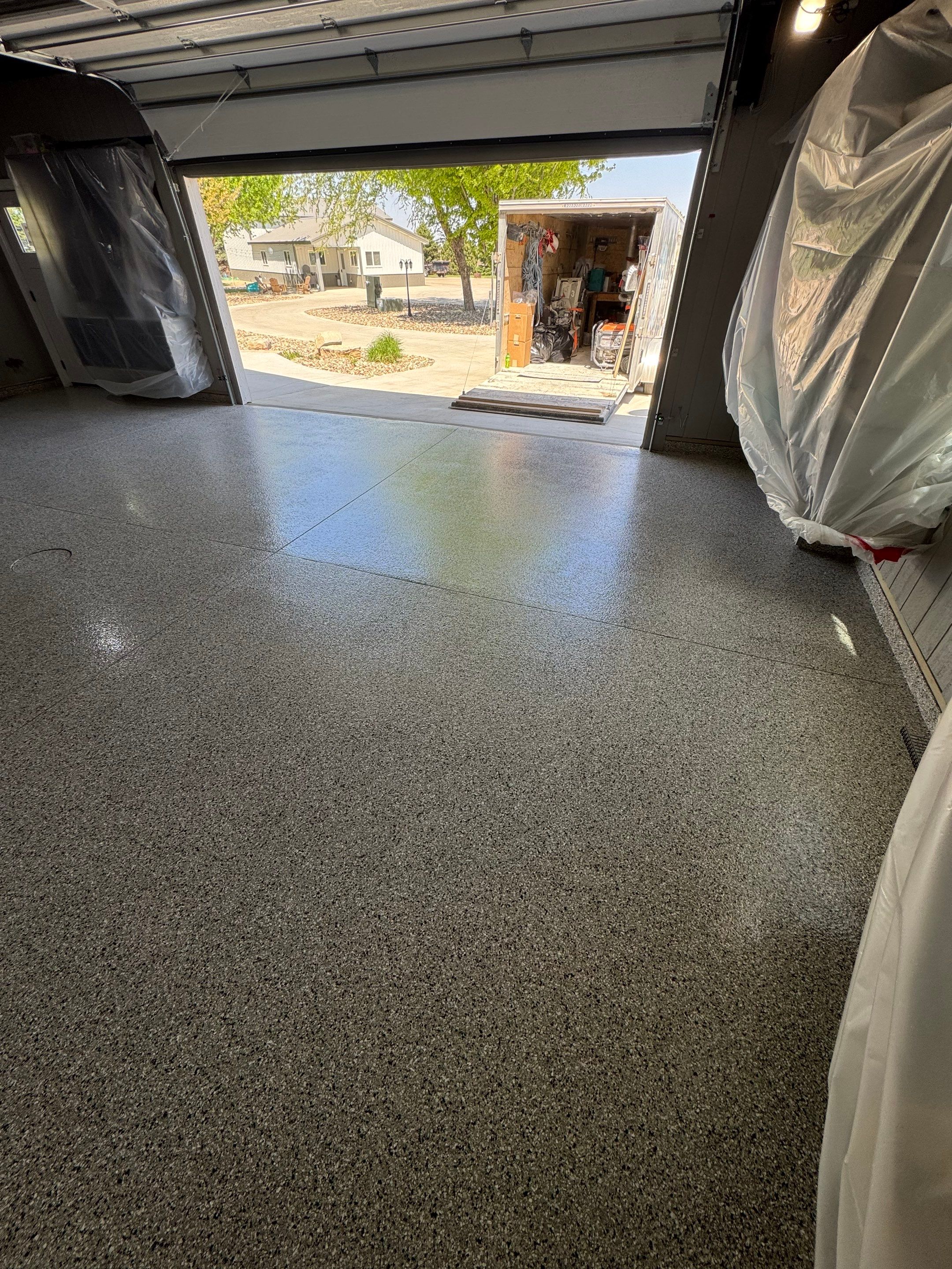 High-Gloss Grey Epoxy Floor Coating for Inwood Garage by Select Painting, Coatings & Garage Cabinets